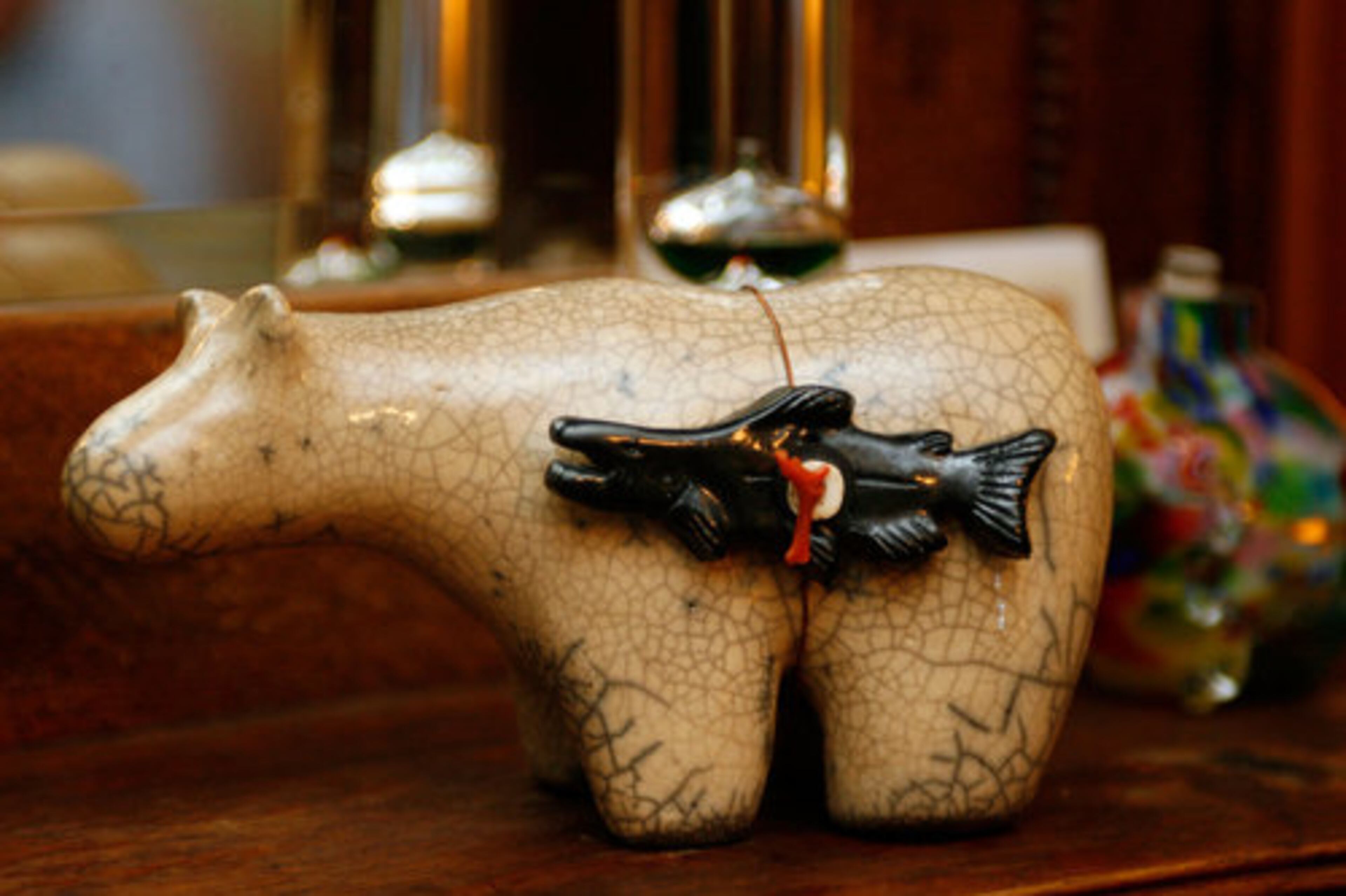 A bear figurine is displayed on the mantle in the Bolognese/McCord home. A neighbor brought it to them from a visit to Alaska.