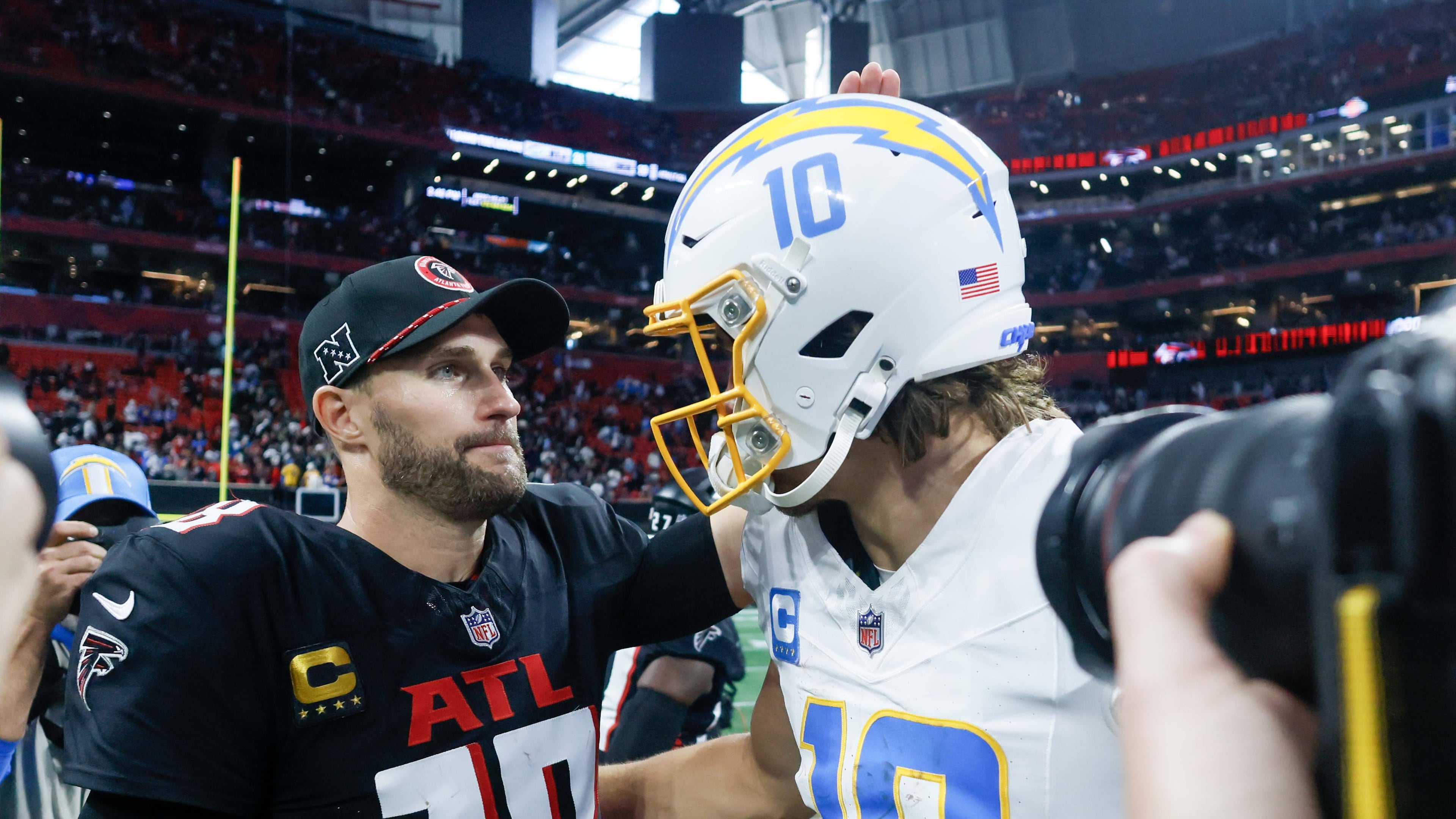 After the game, Los Angeles Chargers quarterback Justin Herbert (10) greets Atlanta Falcons quarterback Kirk Cousins (18). Cousins was intercepted four times as the Chargers won 17-13 at Mercedes-Benz Stadium on Sunday, December 1, 2024.
(Miguel Martinez/ AJC)