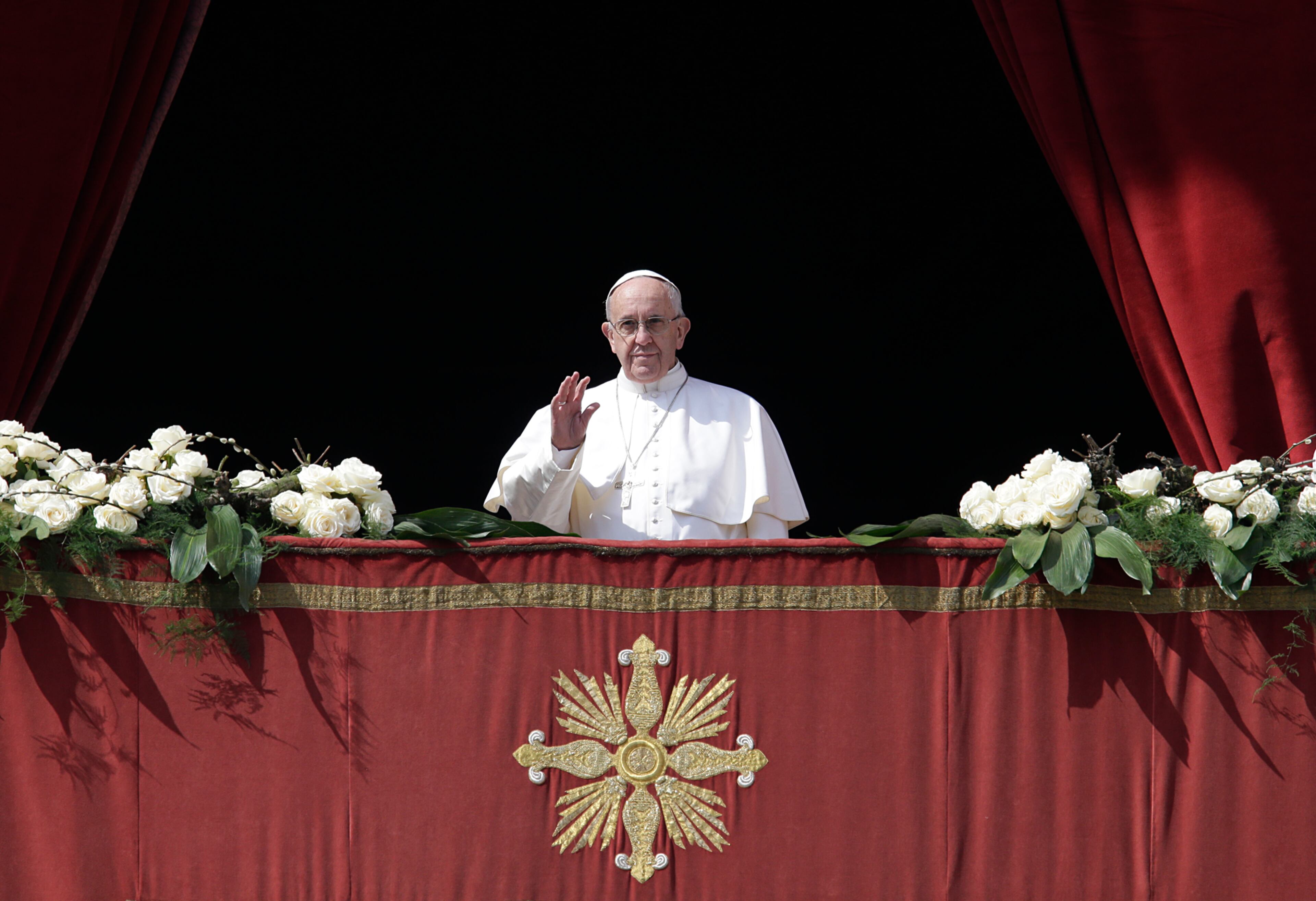 Pope Francis delivers the Urbi et Orbi (to the city and to the world) message at end of the Easter Mass, in St. Peter's Square, at the Vatican, on March 27, 2016.