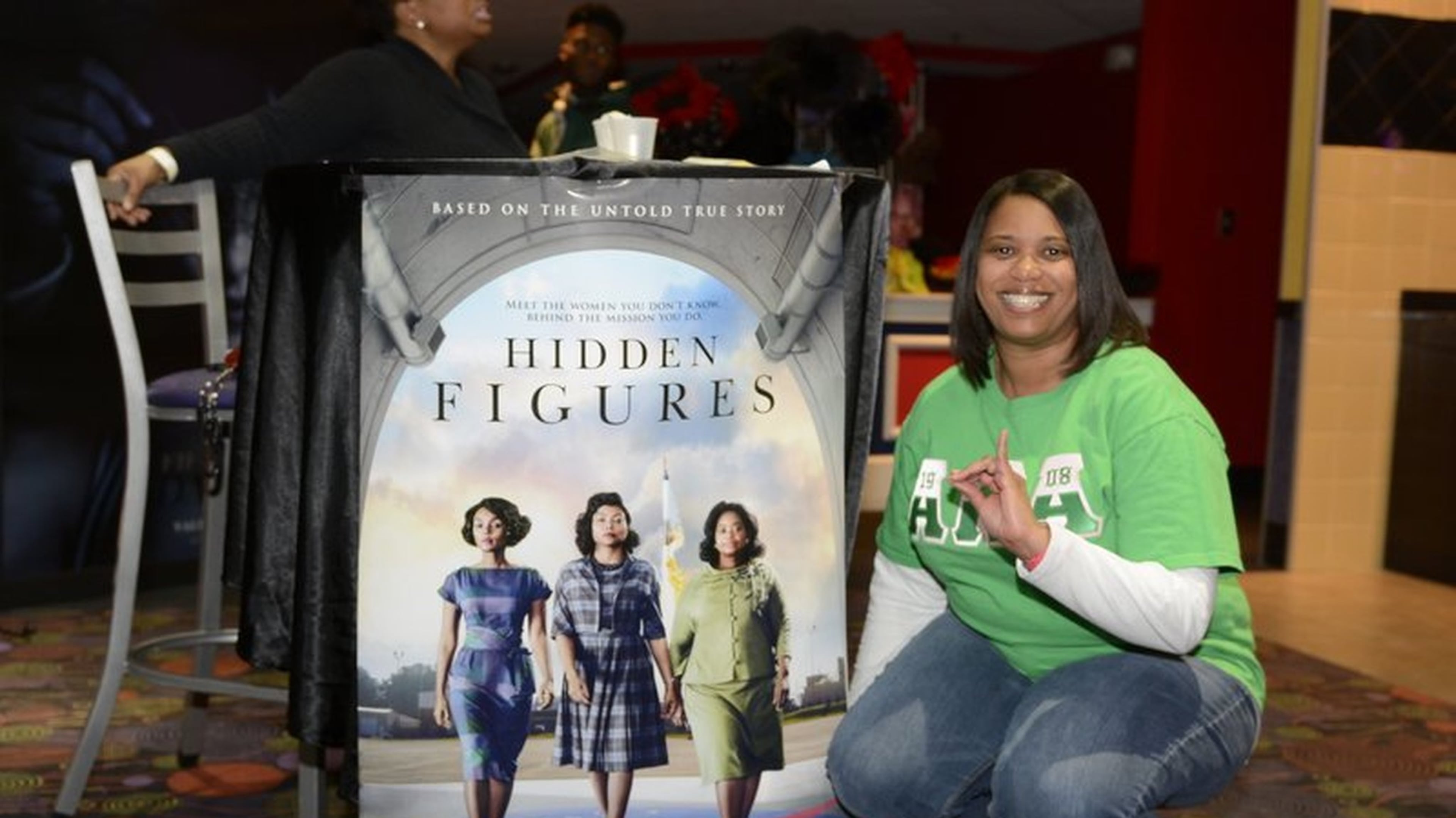 Chantelle Barbour, a member of Alpha Kappa Alpha, at the film “Hidden Figures” in Louisville, Ky. Nationwide, AKA chapters are organizing to support the film. CONTRIBUTED BY RHONDA DUNN PHOTOGRAPHY
