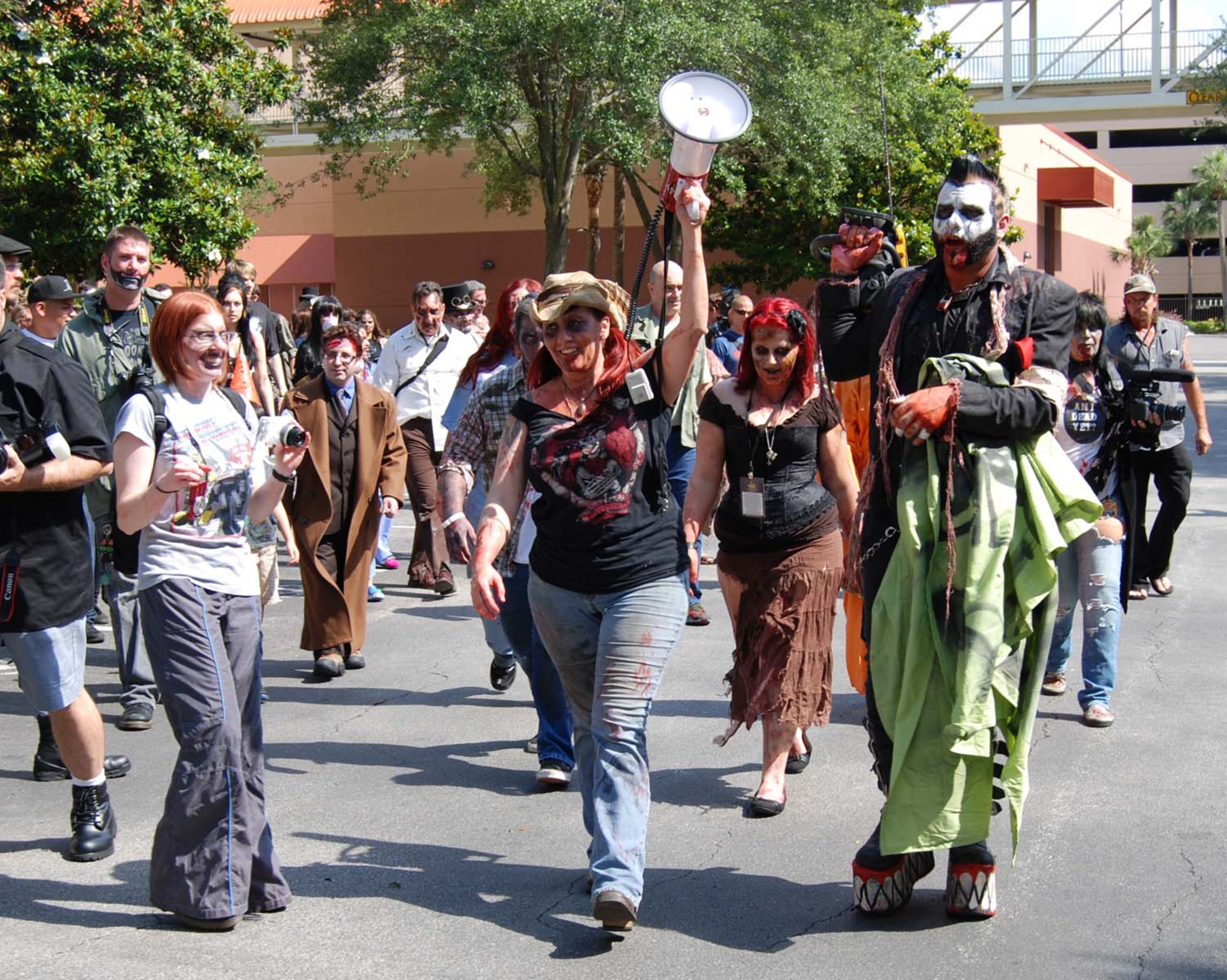 A pack of blood-thirsty zombies marched on the Rosen Centre Hotel in Orlando, Florida to kick off Spooky Empire's annual May-Hem horror convention.