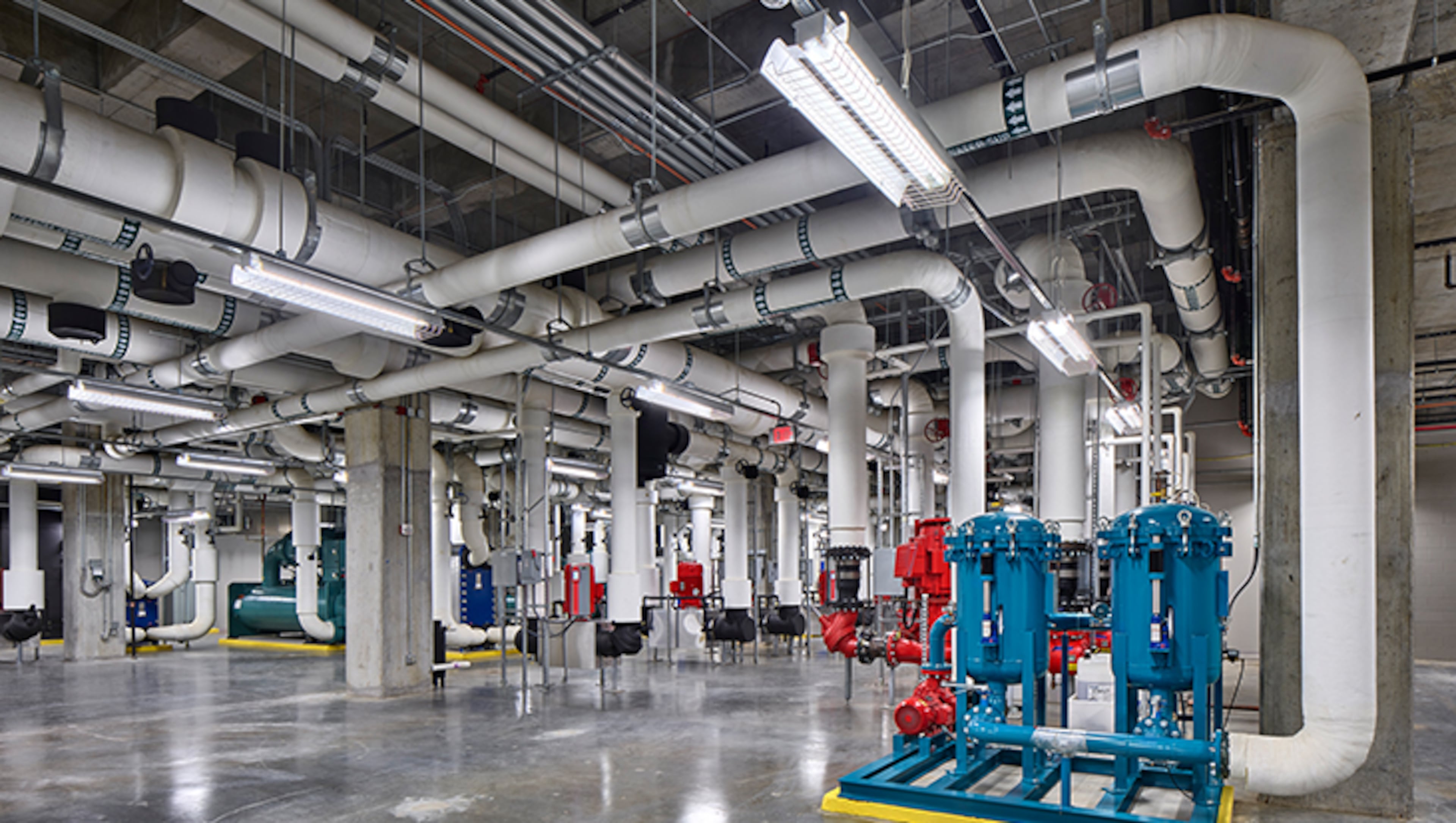 Large cooling tanks and water pumps lie beneath DataBank's three-story data center at Coda at Technology Square in Midtown. Water is used to prevent rows of computer servers and other technology from overheating.