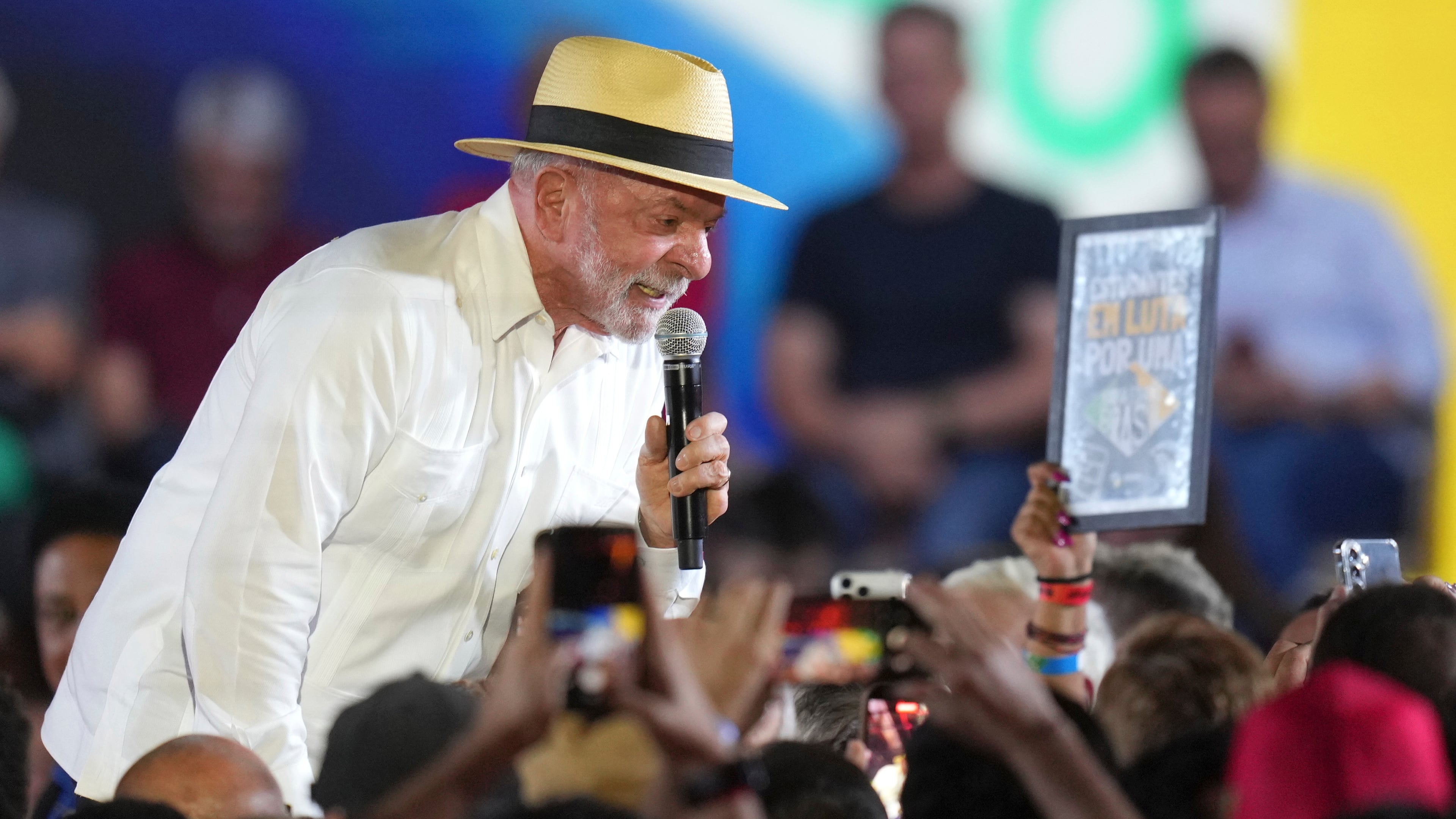 Brazilian President Luiz Inacio Lula da Silva speaks to supporters during the Workers' Party convention, where he was confirmed as the party's presidential candidate for the next election in Sao Paulo, Brazil, Sunday, Aug. 2, 2026. (AP Photo/Andre Penner)
