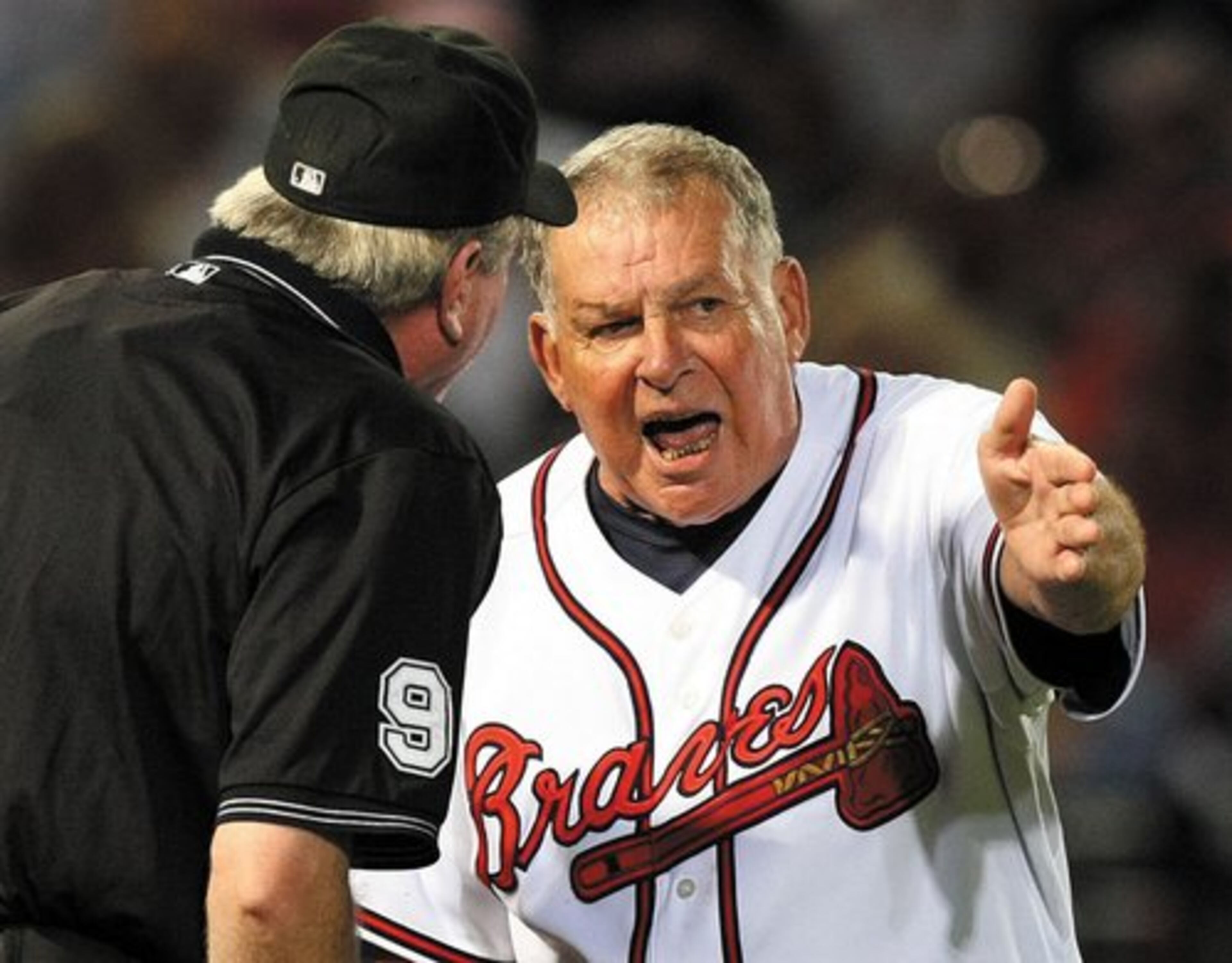Atlanta Braves manager Bobby Cox argues the call with home plate umpire Brian Gorman after Yunel Escobar was called out at 1st base when the throw struck him in the back during the 4th inning of the game against the Cincinnati Reds.