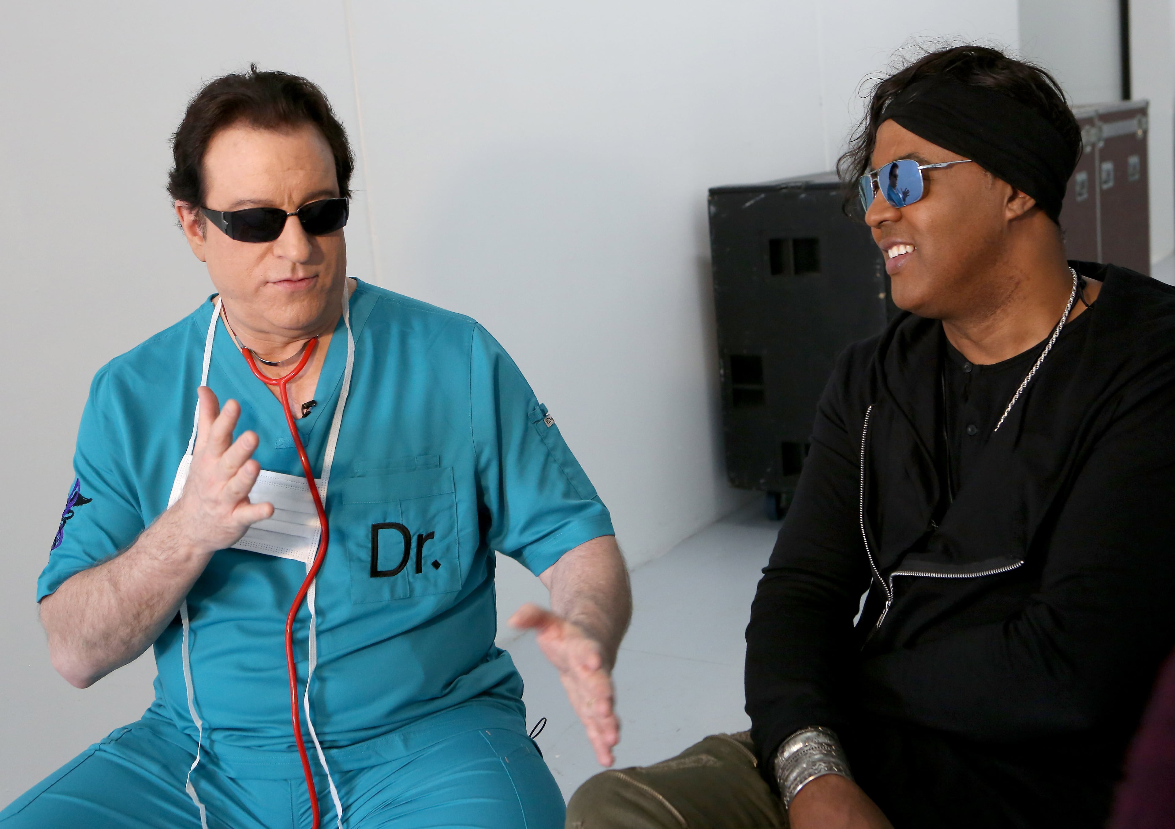 Keyboarders "Doctor" Matt Fink talks about how he got his nick name and image in the beginning days of Prince's band The Revolution, as bassist BrownMark, right, looks on. Photo: Ryon Horne/AJC