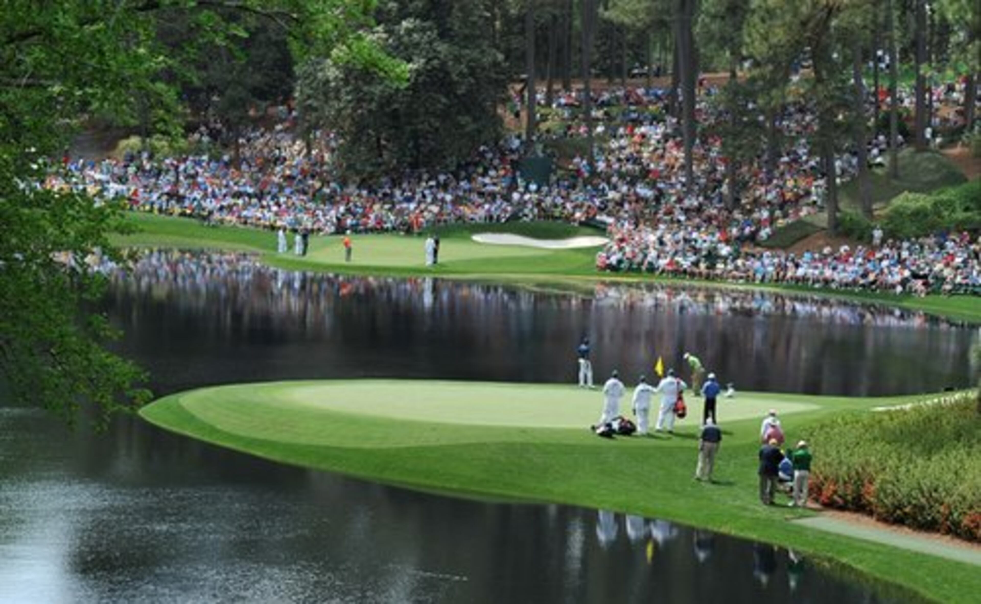 The par three contest at Augusta National offers a unique opportunity for fans to see several holes at a time.