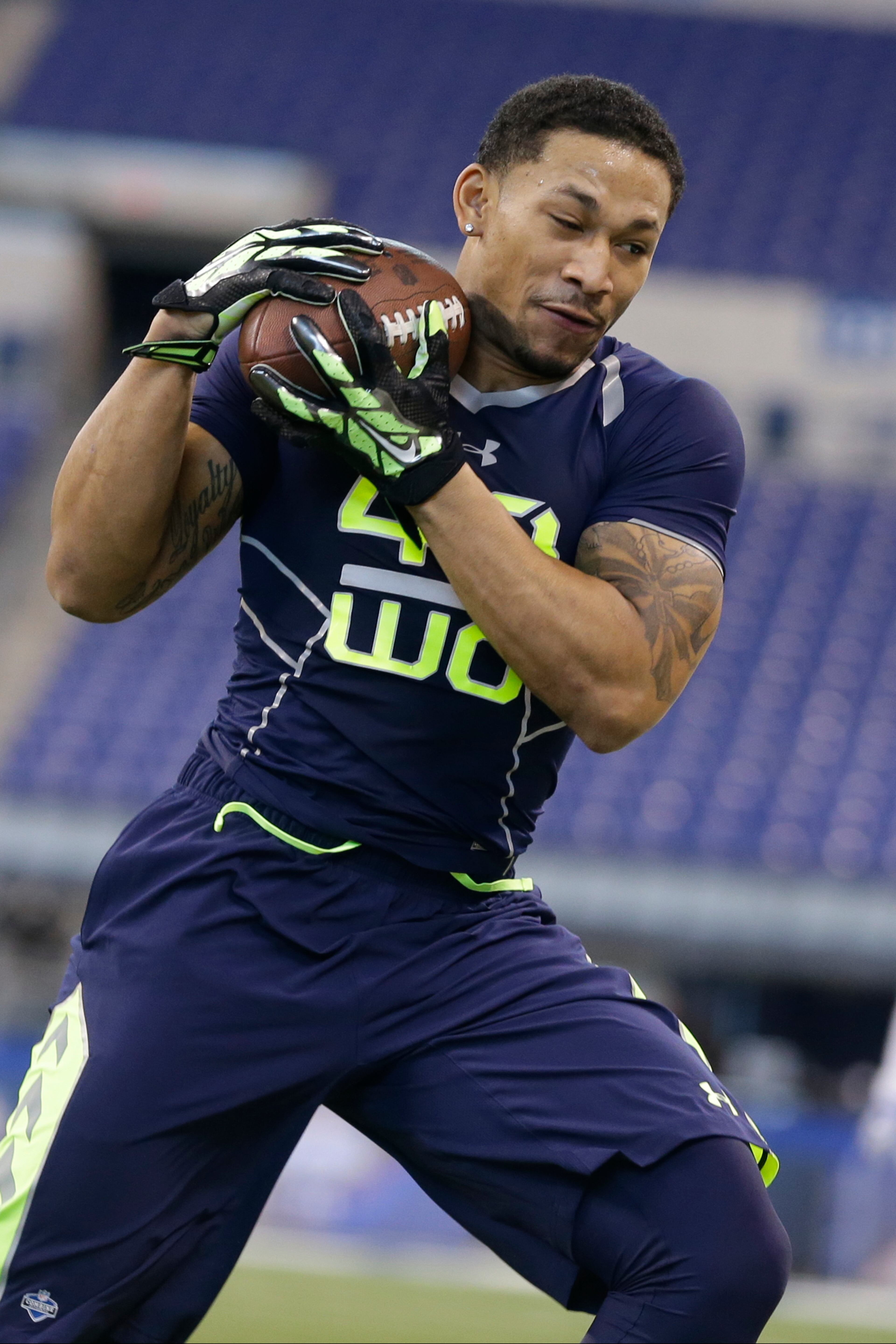 Georgia State wide receiver Albert Wilson makes a catch during a drill at the NFL football scouting combine in Indianapolis, Sunday, Feb. 23, 2014. (AP Photo/Michael Conroy)