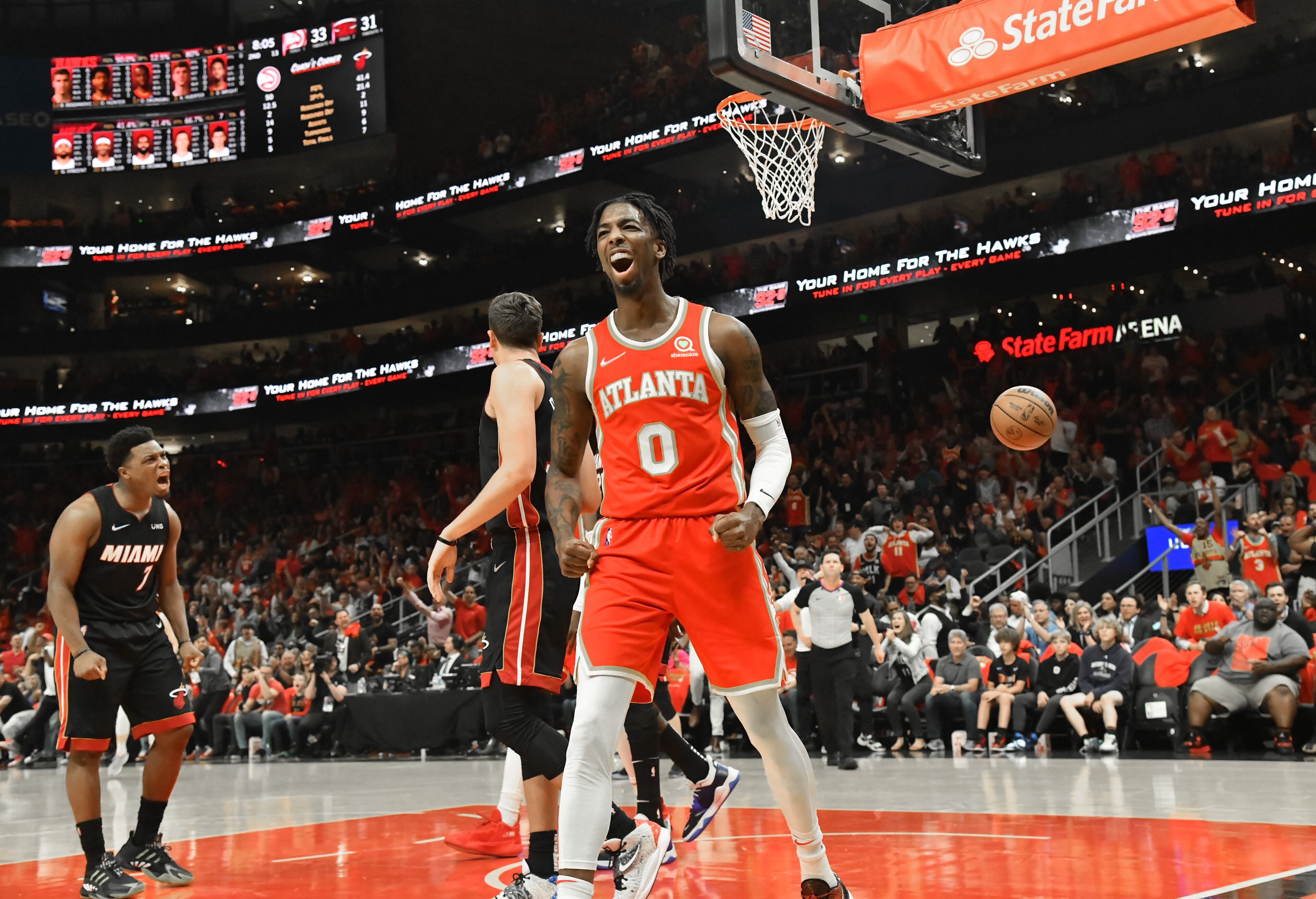 April 22, 2022 Atlanta - Atlanta Hawks' guard Delon Wright (0) reacts afters scoring during the first half in Game 3 of the first round of the NBA playoffs at State Farm Arena on Friday, April 22, 2022. (Hyosub Shin / Hyosub.Shin@ajc.com)