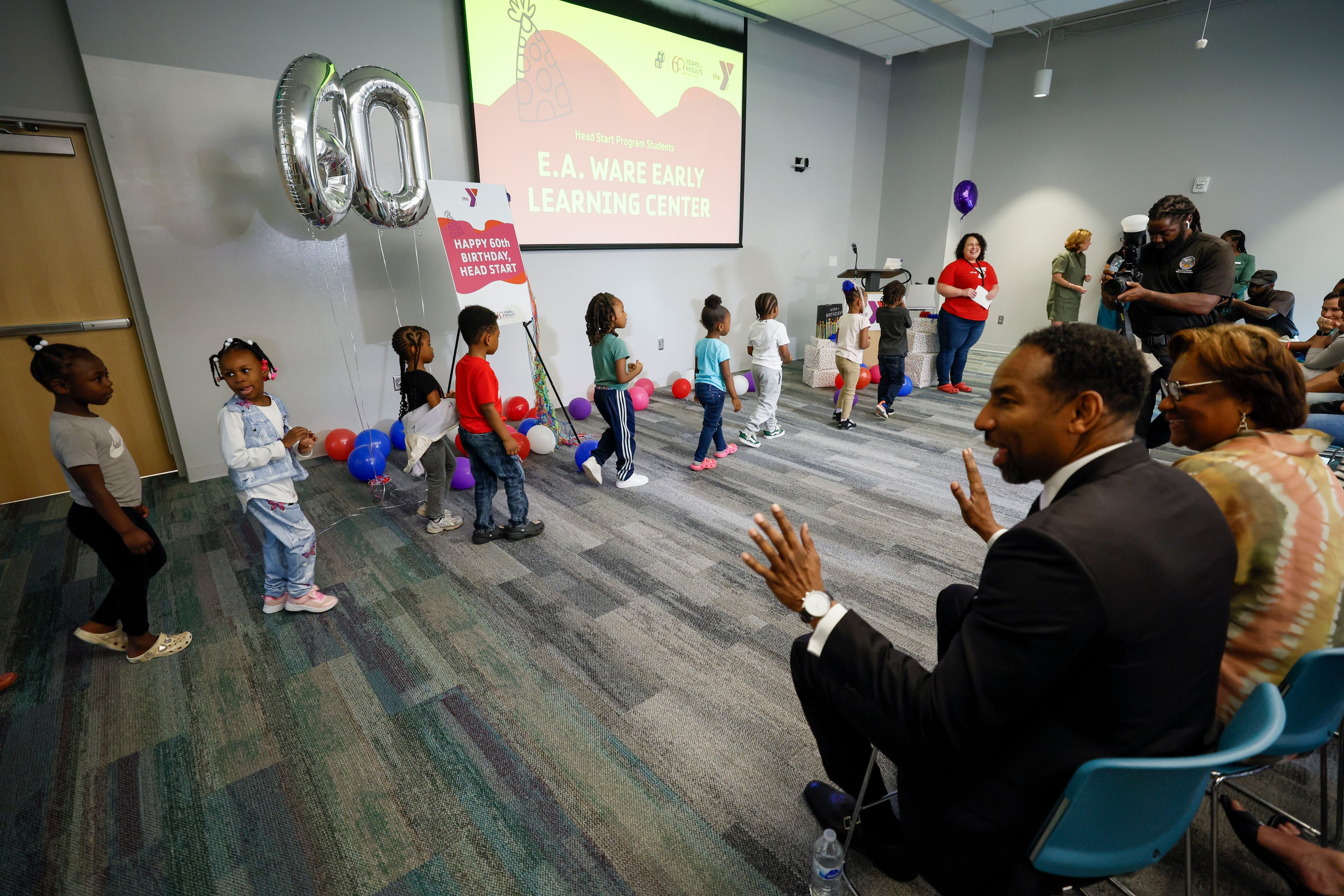 Atlanta Mayor Andre Dickens greeted students who gathered to sing "Happy Birthday" to the federal Head Start program on the 60th anniversary of its inception, Monday. (Miguel Martinez/ AJC)
