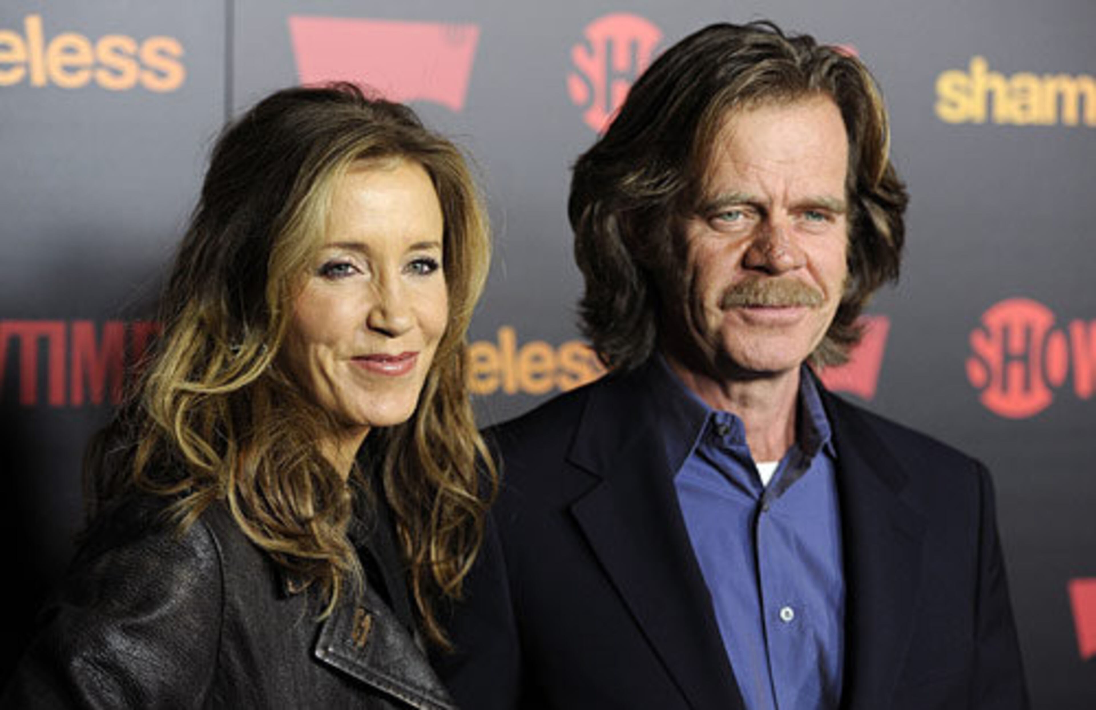 Macy and wife Felicity Huffman, star of "Desperate Housewives," pose on the red carpet.