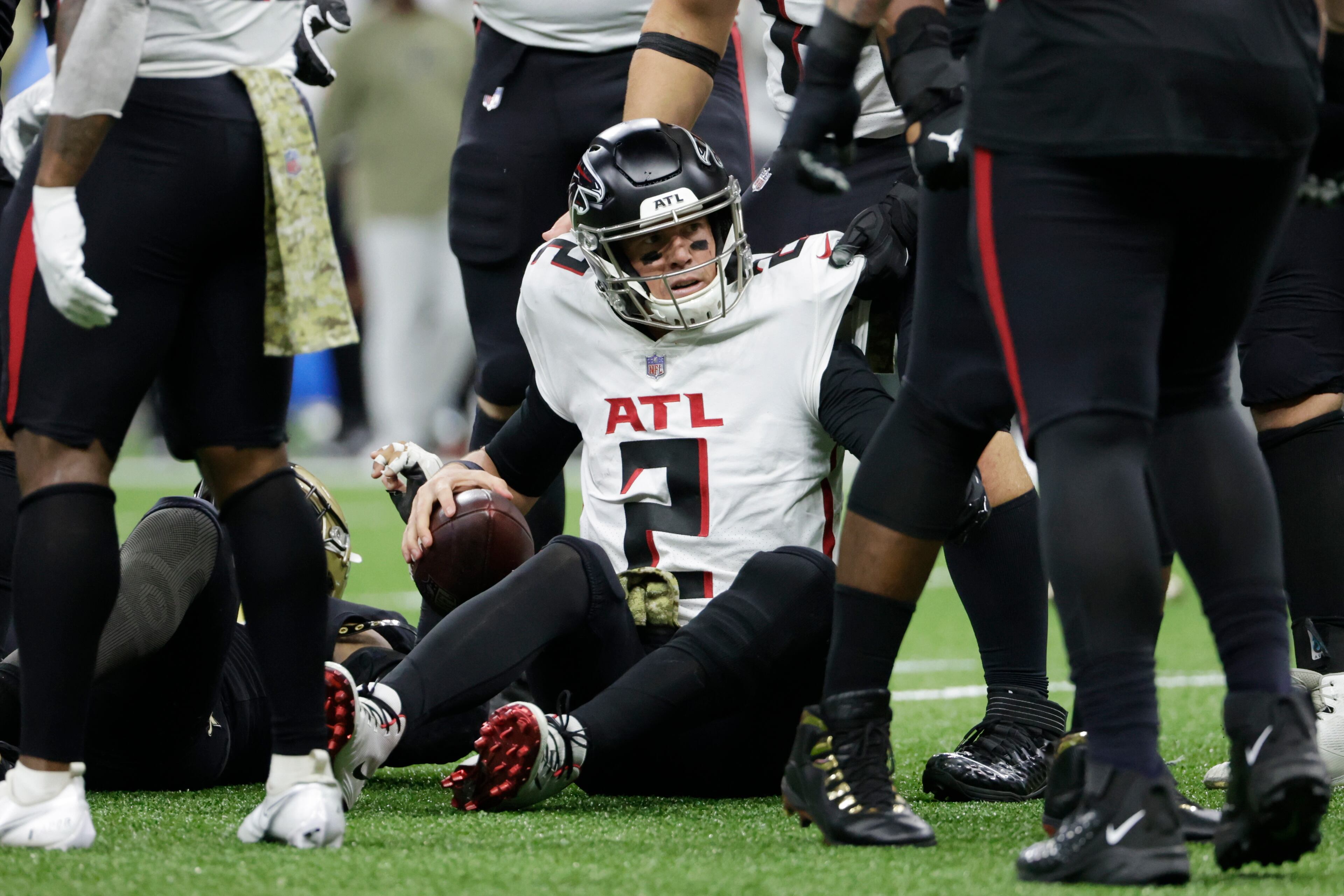 Atlanta Falcons quarterback Matt Ryan (2) sits on the turf after a sack against the New Orleans Saints during the second half of an NFL football game, Sunday, Nov. 7, 2021, in New Orleans. (AP Photo/Derick Hingle)