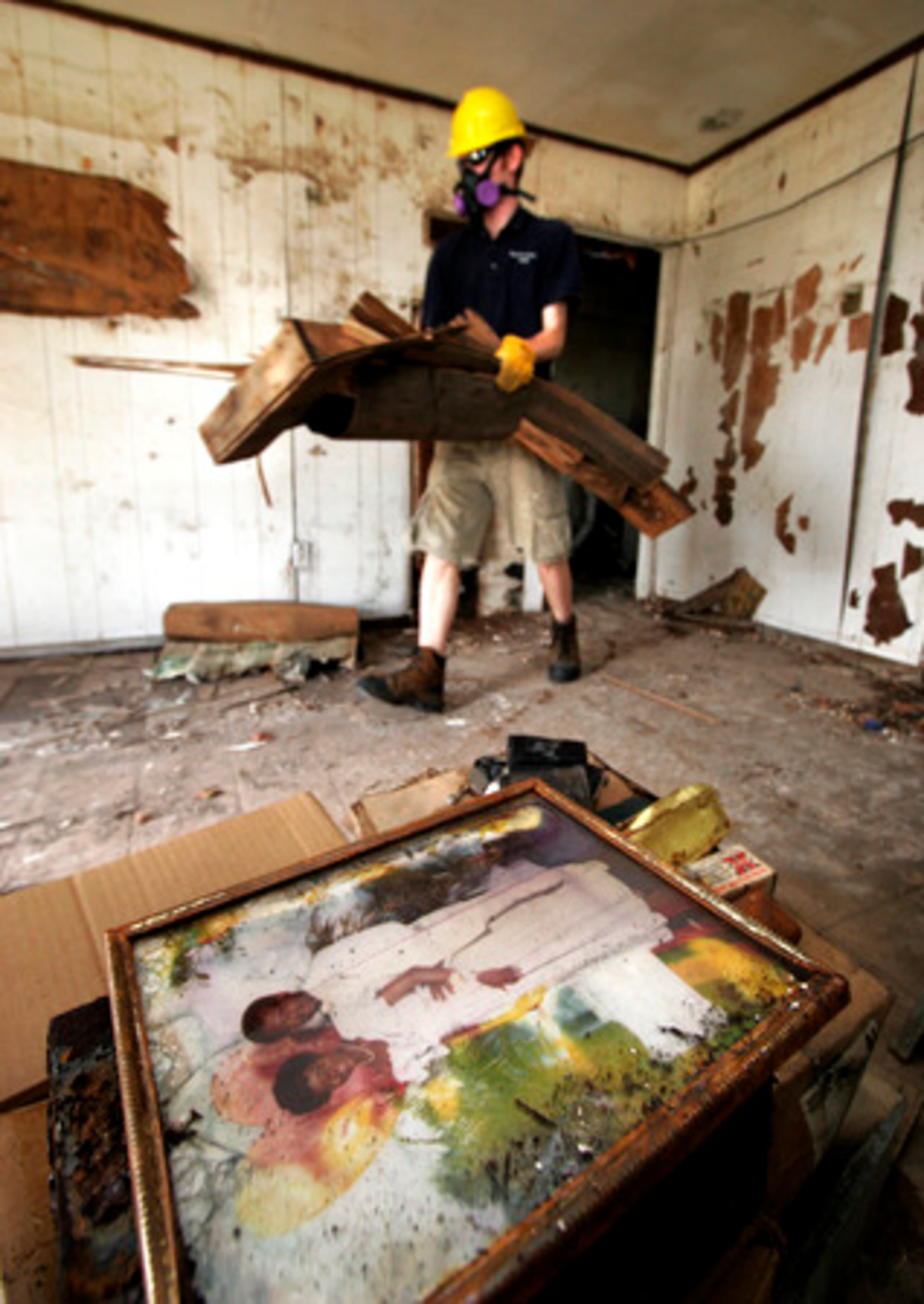 Volunteerism: Seth Coady, a student from Cascadia Community College in Bothell, Wash., helps gut a home in the Press Park area of New Orleans during his spring break in 2007. The thousands of students willing to help with manual labor have been a source of joy, and relief for many recovery-weary residents 19 months after the hurricane.