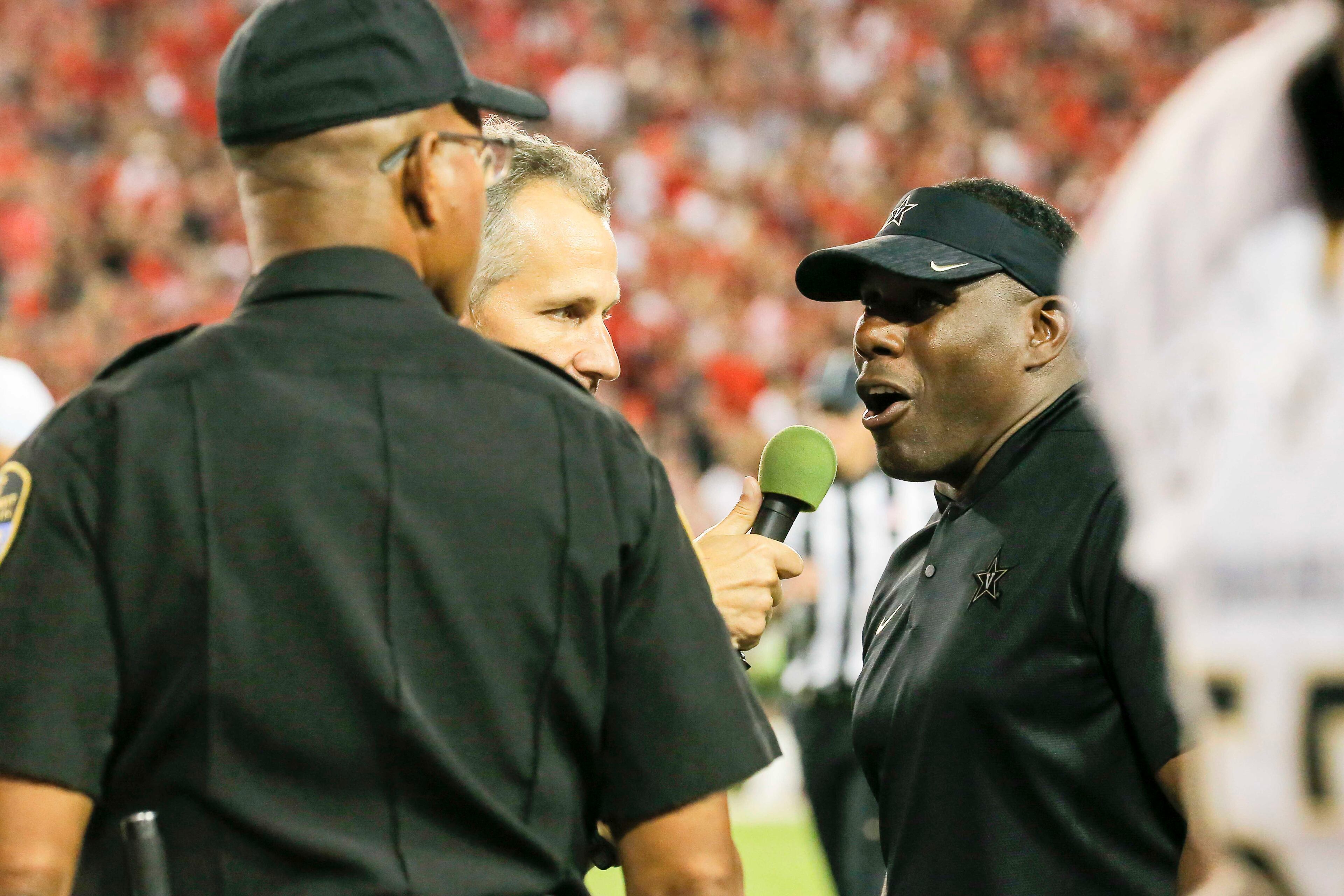 10/06/2018 -- Athens, Georgia -- Vanderbilt head coach Derek Mason answers questions at the end of the second quarter during an NCAA college football game at Sanford Stadium in Athens, Saturday, October 6, 2018. (ALYSSA POINTER/ALYSSA.POINTER@AJC.COM)