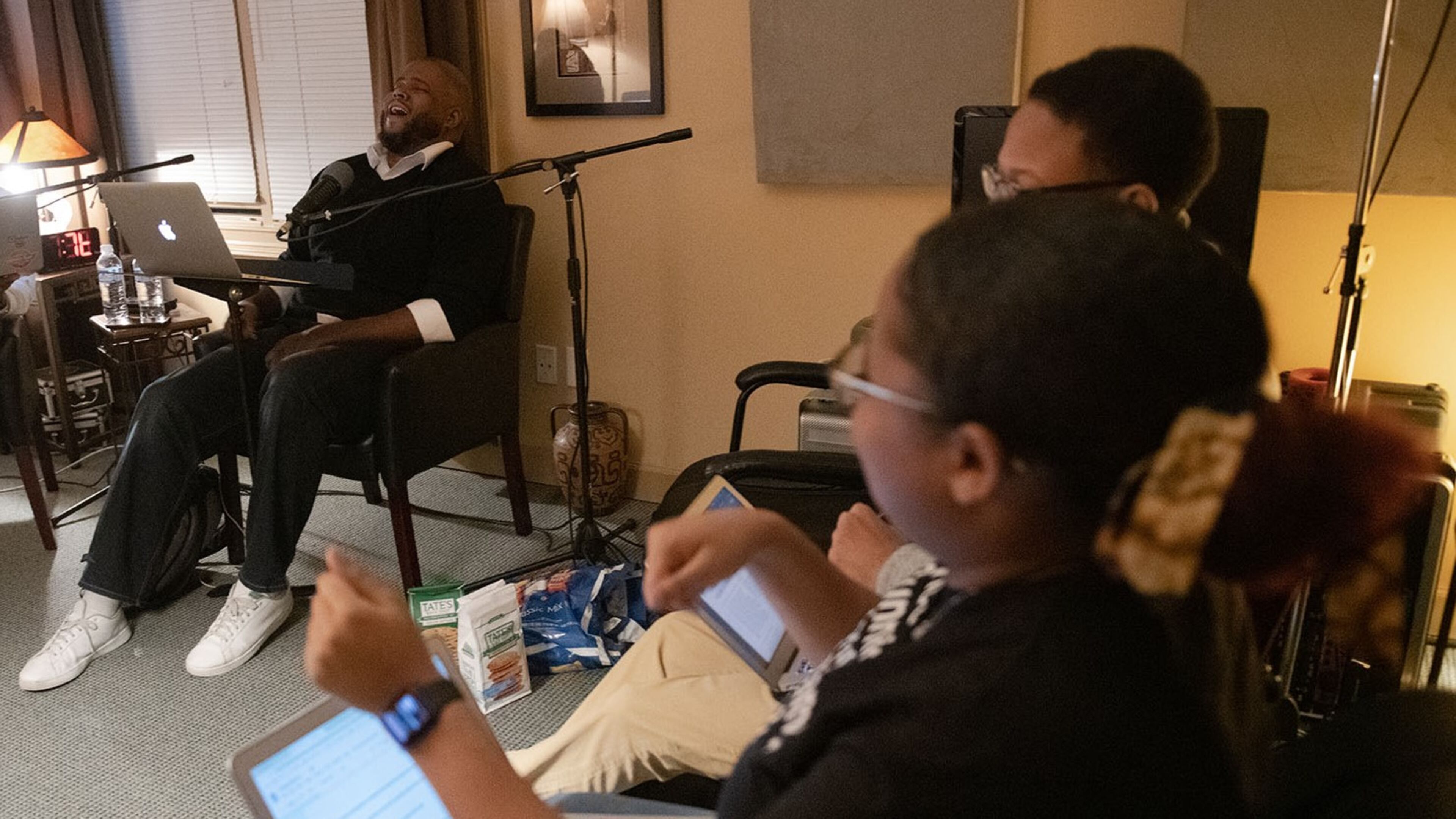 From left, Darius Hicks, host of the podcast “While Black,” interviews Harvard Debate Council Diversity Project alumni Xavier Shankle and Payton Gunner in Roswell, Ga., on Jan. 6, 2020. PHOTO BY ELISSA BENZIE for The Atlanta Journal-Constitution