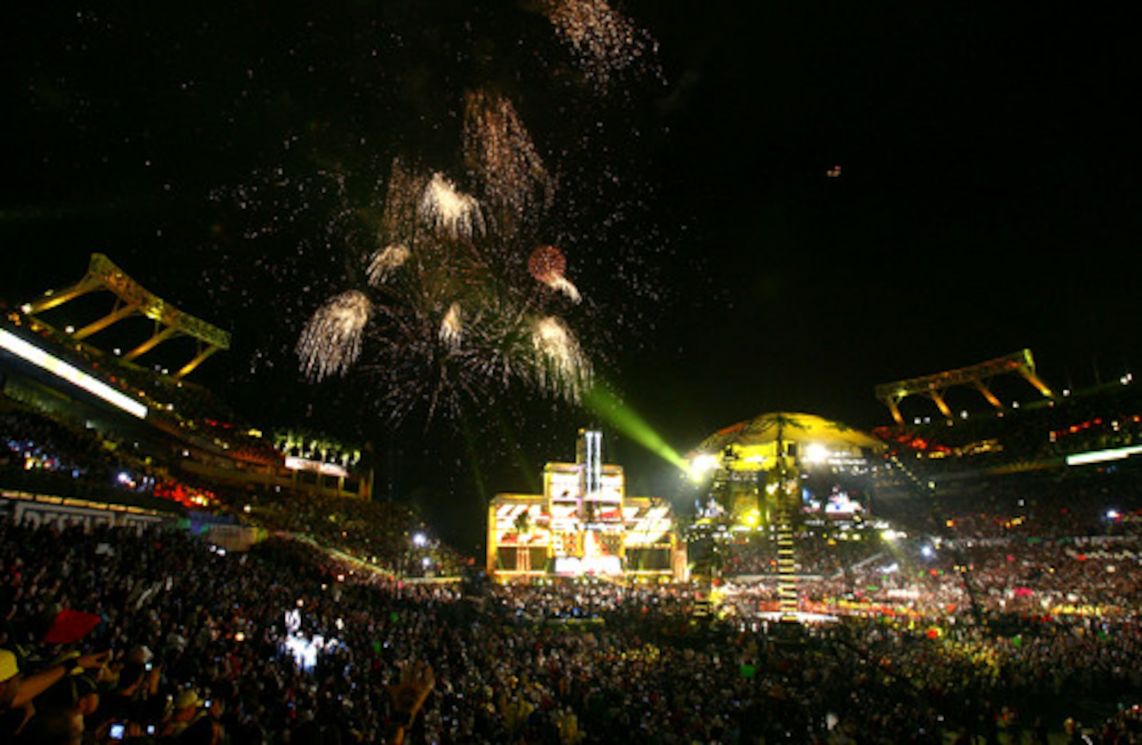 Fireworks explode as Ric Flair's match begins during WrestleMania XXIV at the Citrus Bowl. Fire officials say a pyrotechnics malfunction sent fireworks and hot cables flying into the crowd.