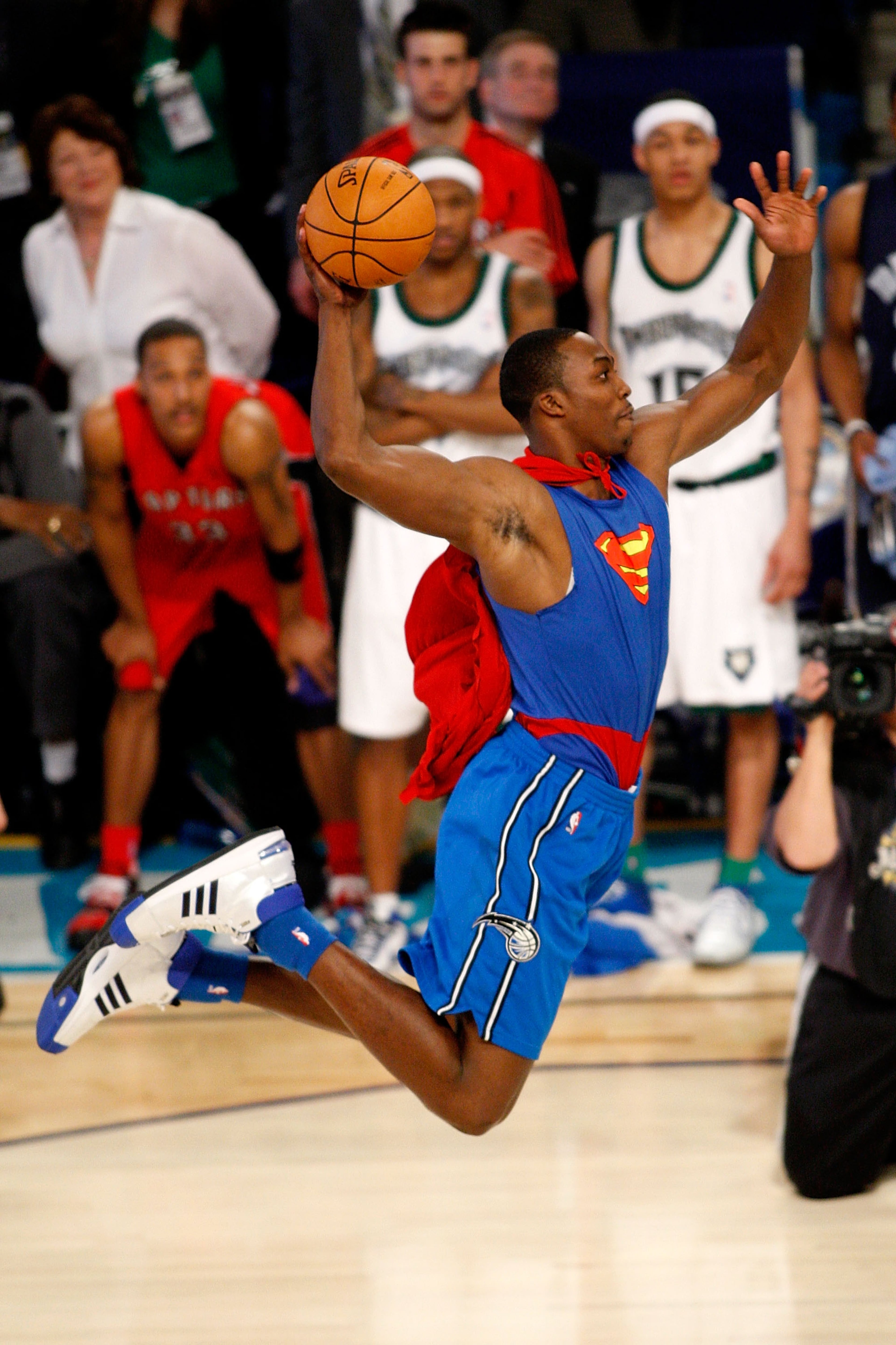 Howard soars through the air during a slam dunk contest. Photo by Getty Images.