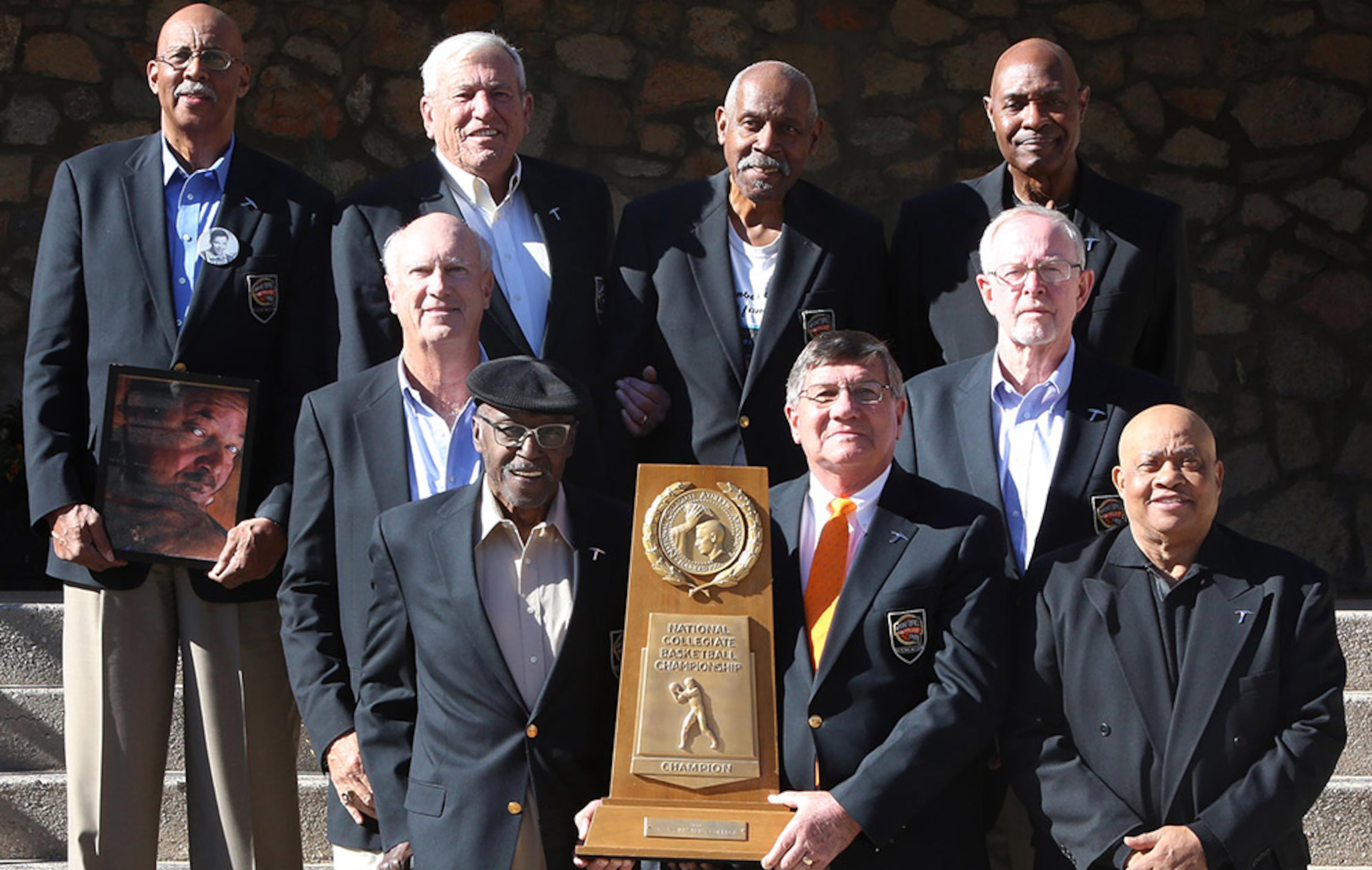 Most of the members of the 1966 Texas Western team posed at a 50th anniversary reunion Feb. 6, 2016. They stood in the same order as in 1966. Orsten Artis (front row, from left), Togo Railey and Willie Worsley. Middle row, from left: Dick Myers, Louis Baudoin. Back row, from left: Nevil Shed, Jerry Armstrong, Willie Cager and David Lattin. Not pictured: Bobby Joe Hill (deceased), Harry Flournoy (ill and unable to attend reunion), David Palacio (did not attend), and coach Don Haskins (deceased).