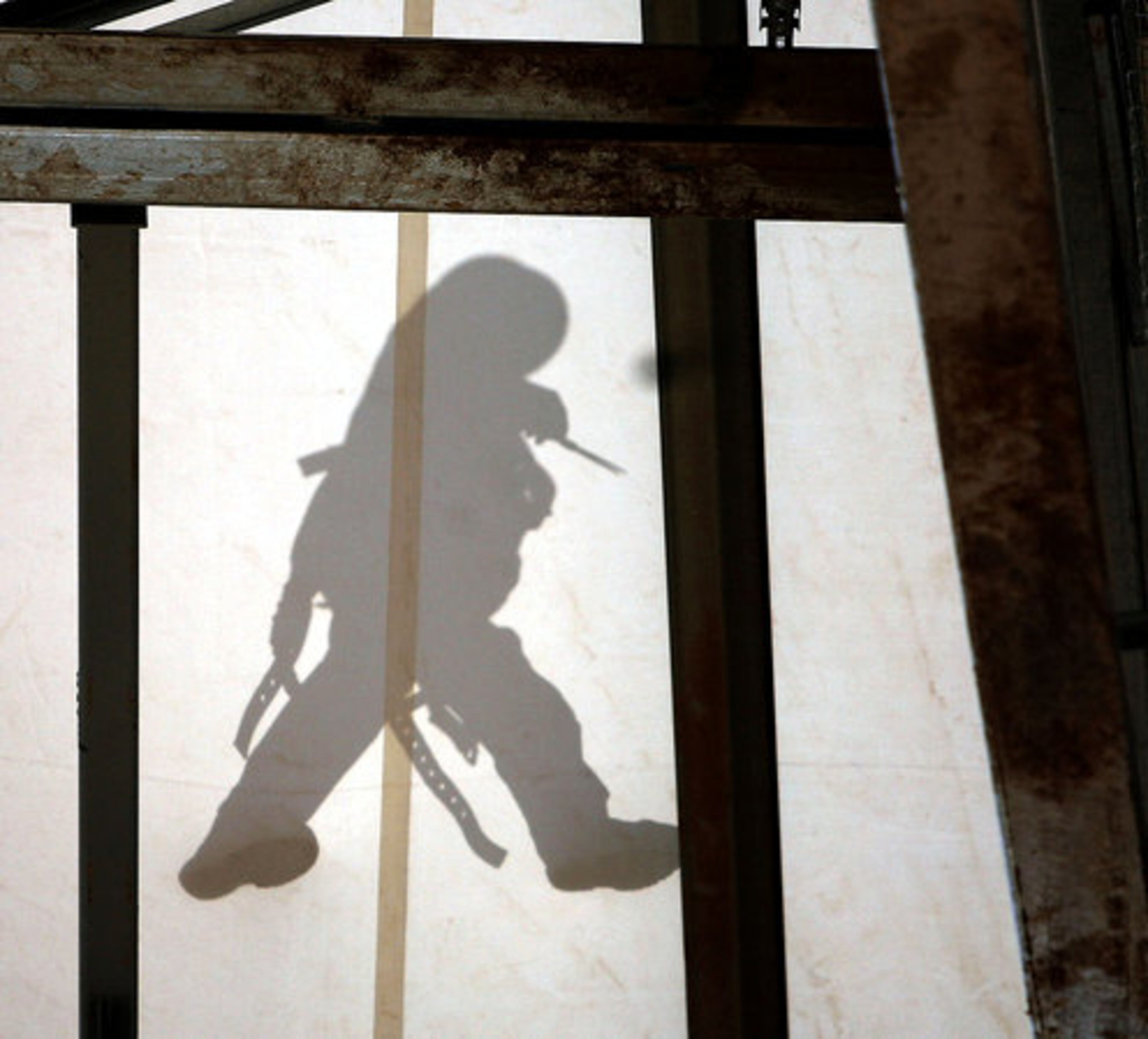 Boomer Balmert, from American Spaceframes Fabricators International (ASFI) in Ocala, walks across the fabric roof of the amphitheatre. The architectural fabric, called Shelter Rite, is made by Seaman Corp. ASFI fabricated the amphitheatre structrure.