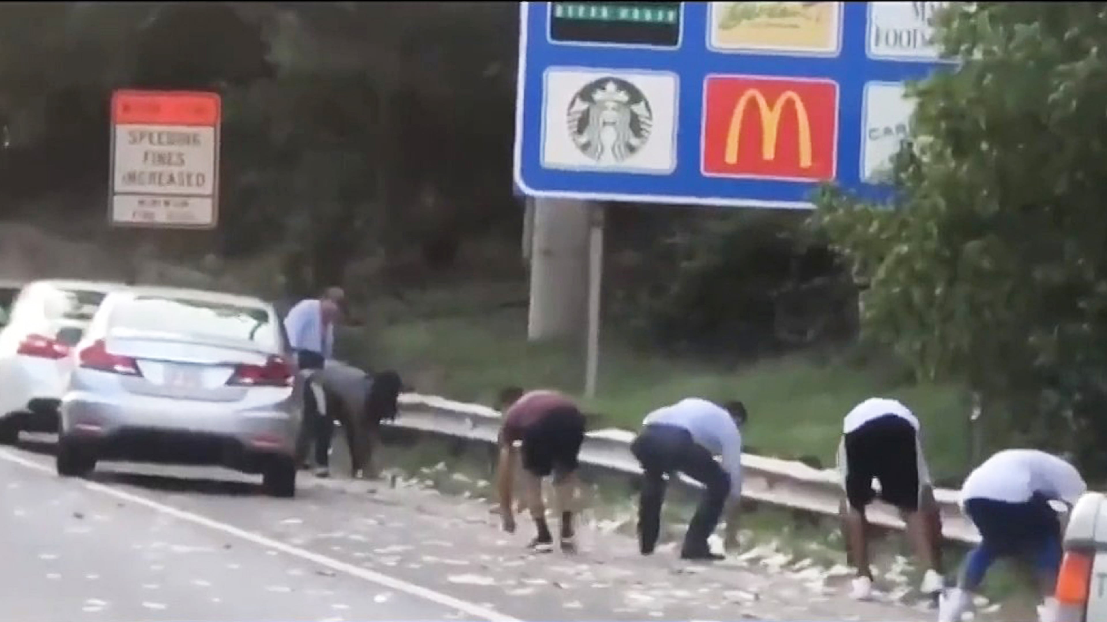 Videos went viral showing drivers stopping to collect cash on the side of I-285.