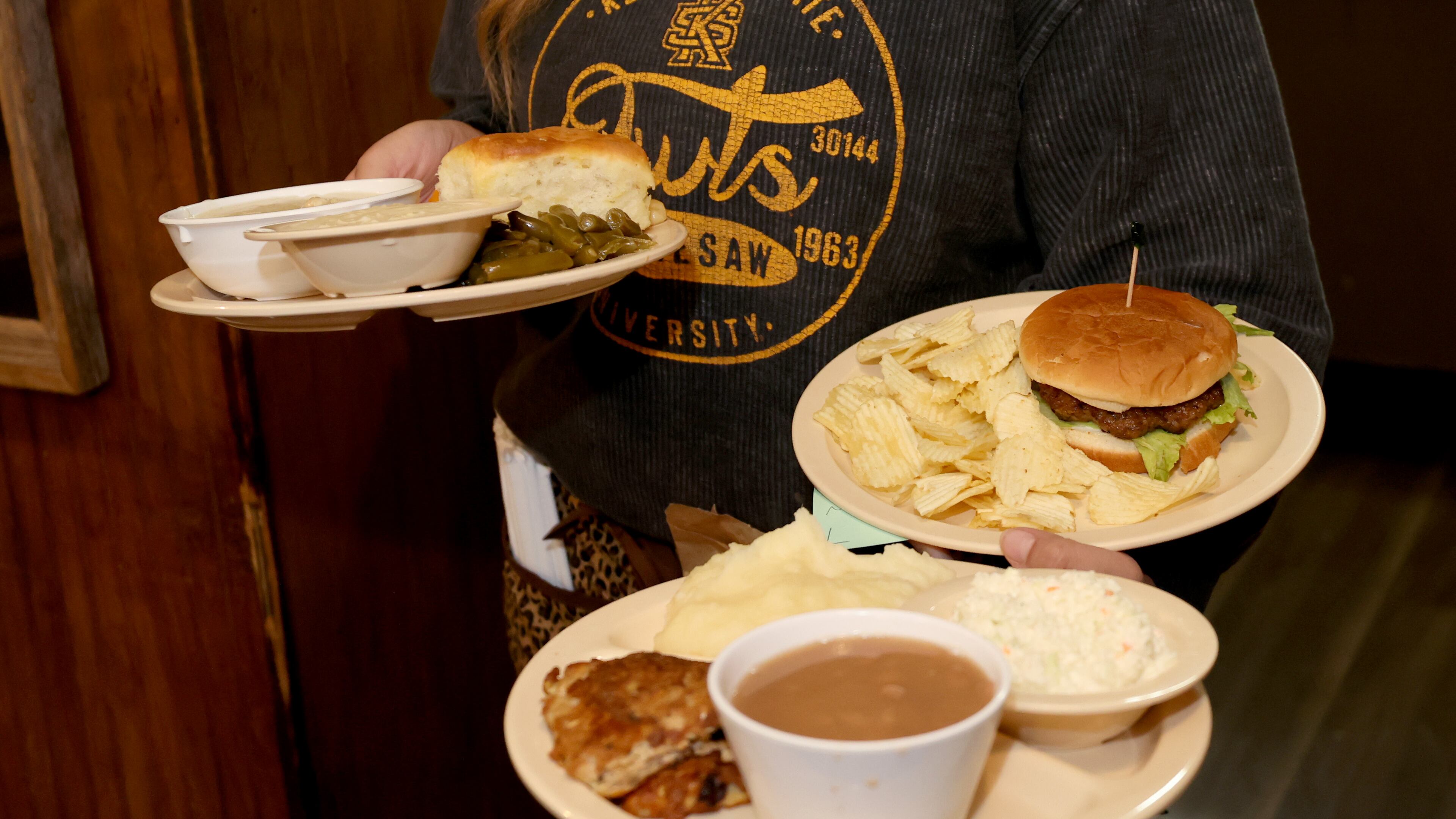 Some restaurant servers manage to stick in your memory for years — many for the right reasons but occasionally for a wrong reason (such as judging a customer by their attire, refusing to substitute a side or being scoffed at for just ordering dessert). (Jason Getz / AJC 2022)