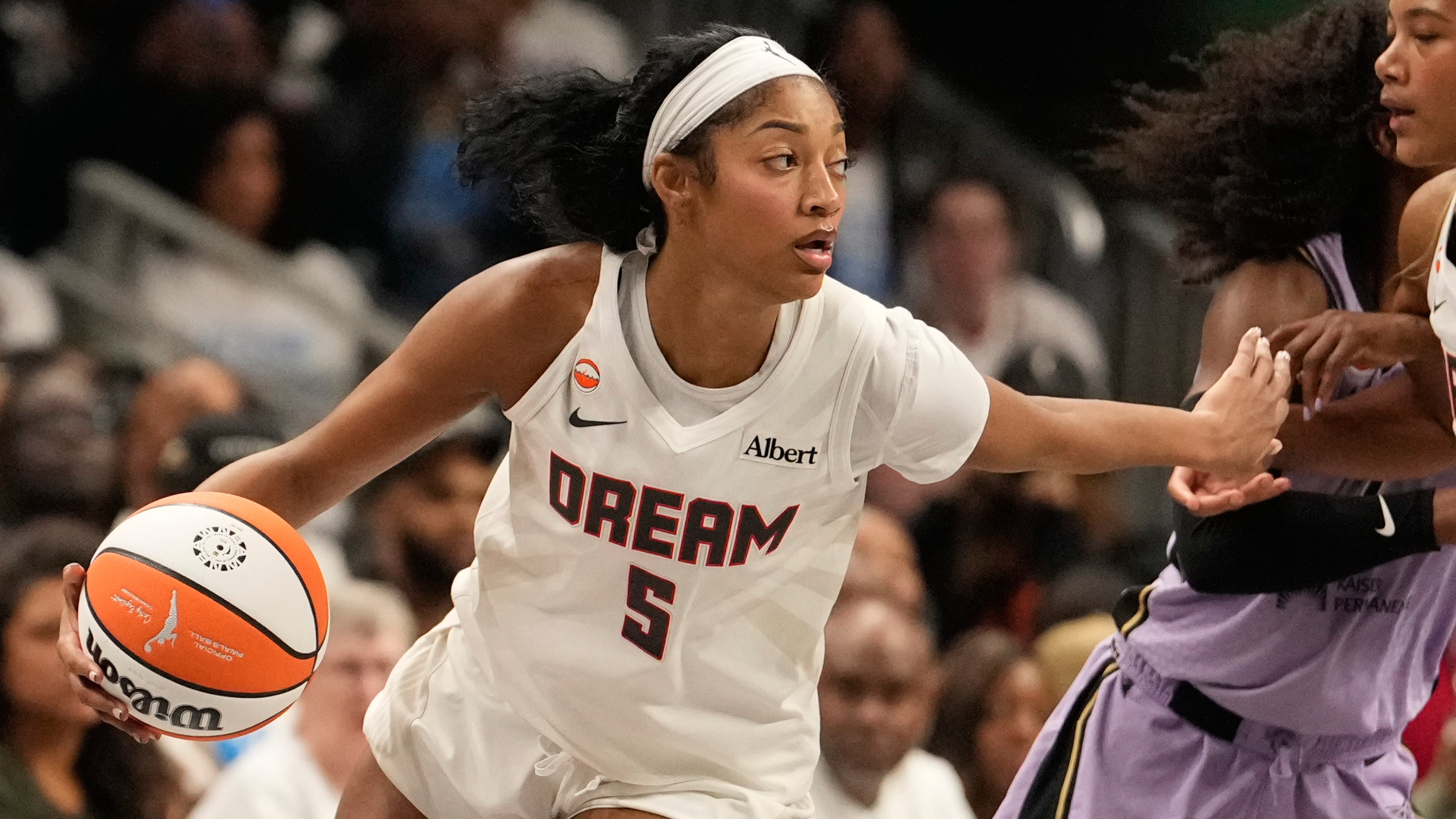 Atlanta Dream forward Angel Reese (5) dribbles the ball during Game 4 of the WNBA basketball finals against the Golden State Valkyries on Saturday, Oct. 24, 2026, in Atlanta. (AP Photo/Brynn Anderson)