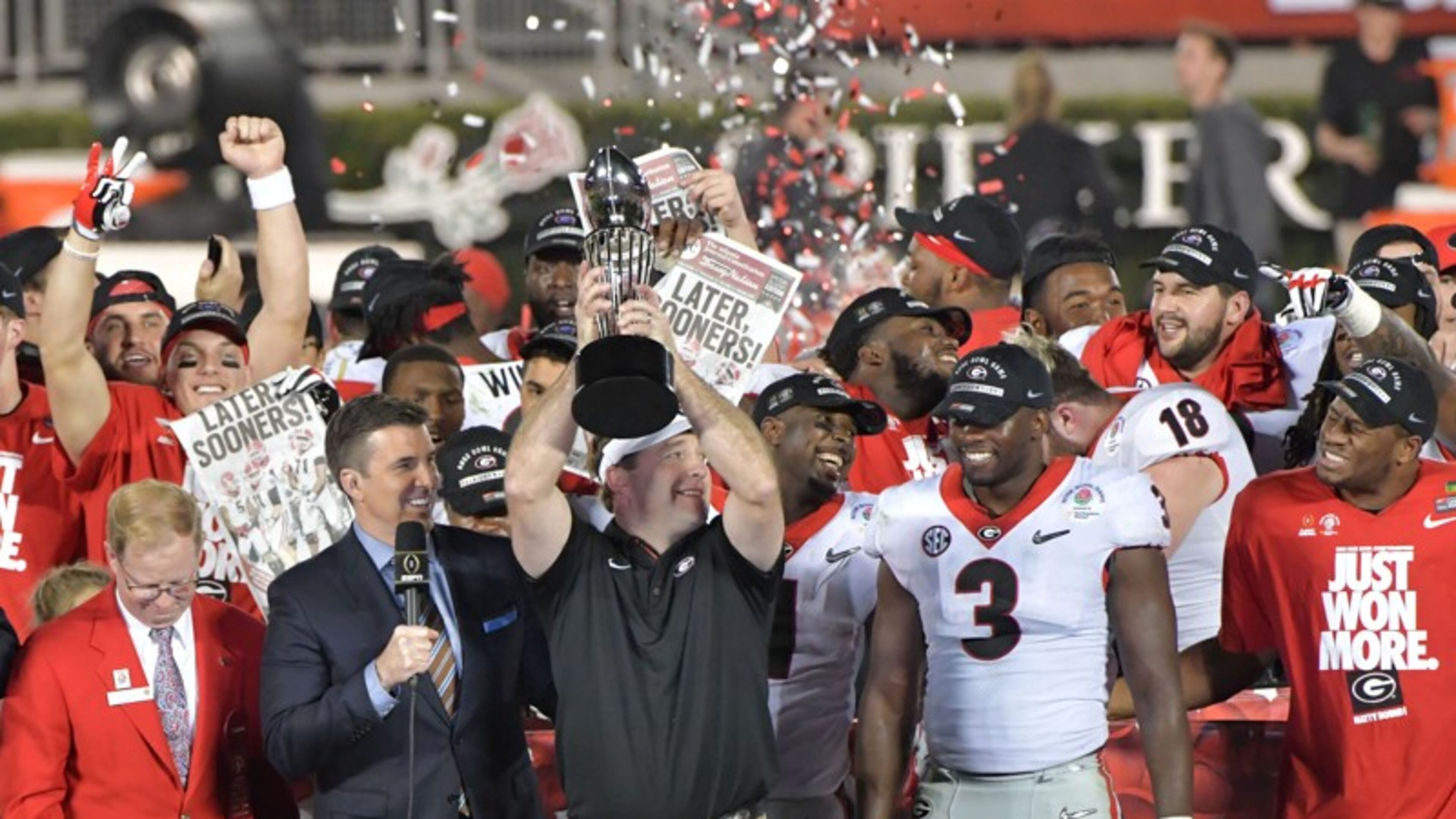 Georgia head coach Kirby Smart holds up the Rose Bowl trophy during the College Football Playoff Semifinal between Georgia and Oklahoma at Rose Bowl Stadium in Pasadena, Calif., on Jan. 1. The championship game against Alabama Monday could be a traffic headache for downtown Atlanta. HYOSUB SHIN / HSHIN@AJC.COM