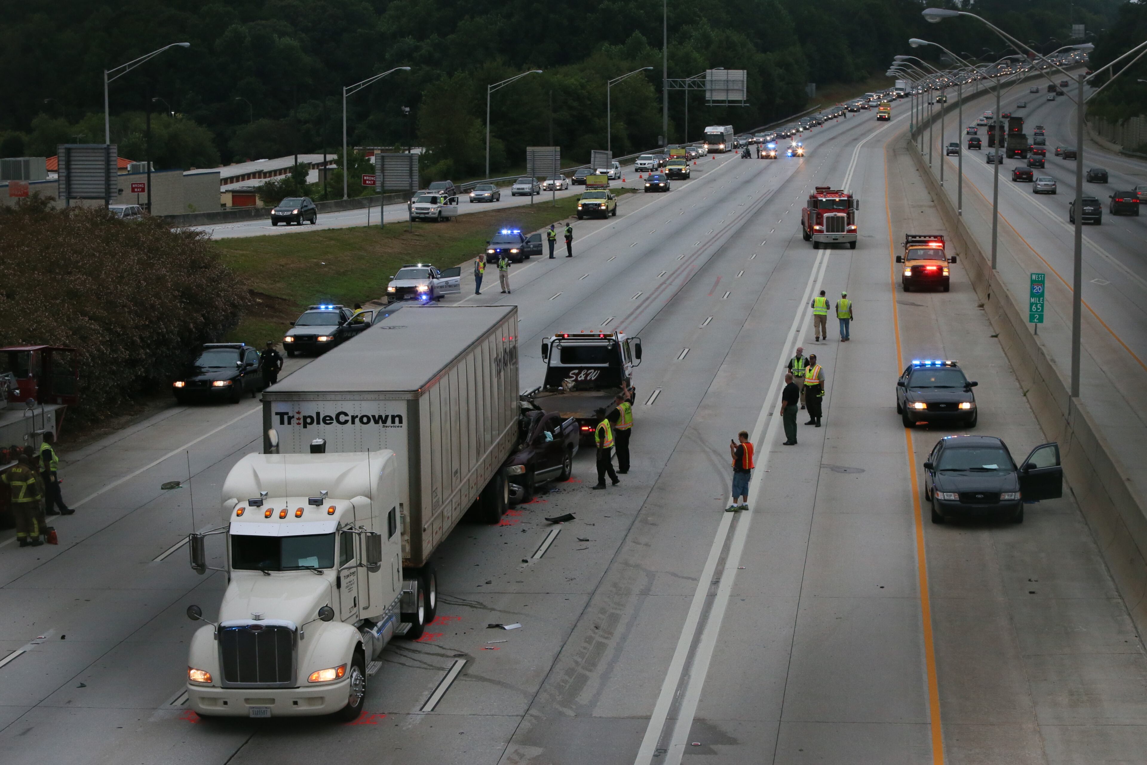 All eastbound lanes of I-20 in DeKalb County were shut down during the early stages of Friday’s morning commute while authorities investigated and cleared a fatal wreck involving a tractor-trailer and a smaller vehicle. BOB ANDRES/BANDRES@AJC.COM