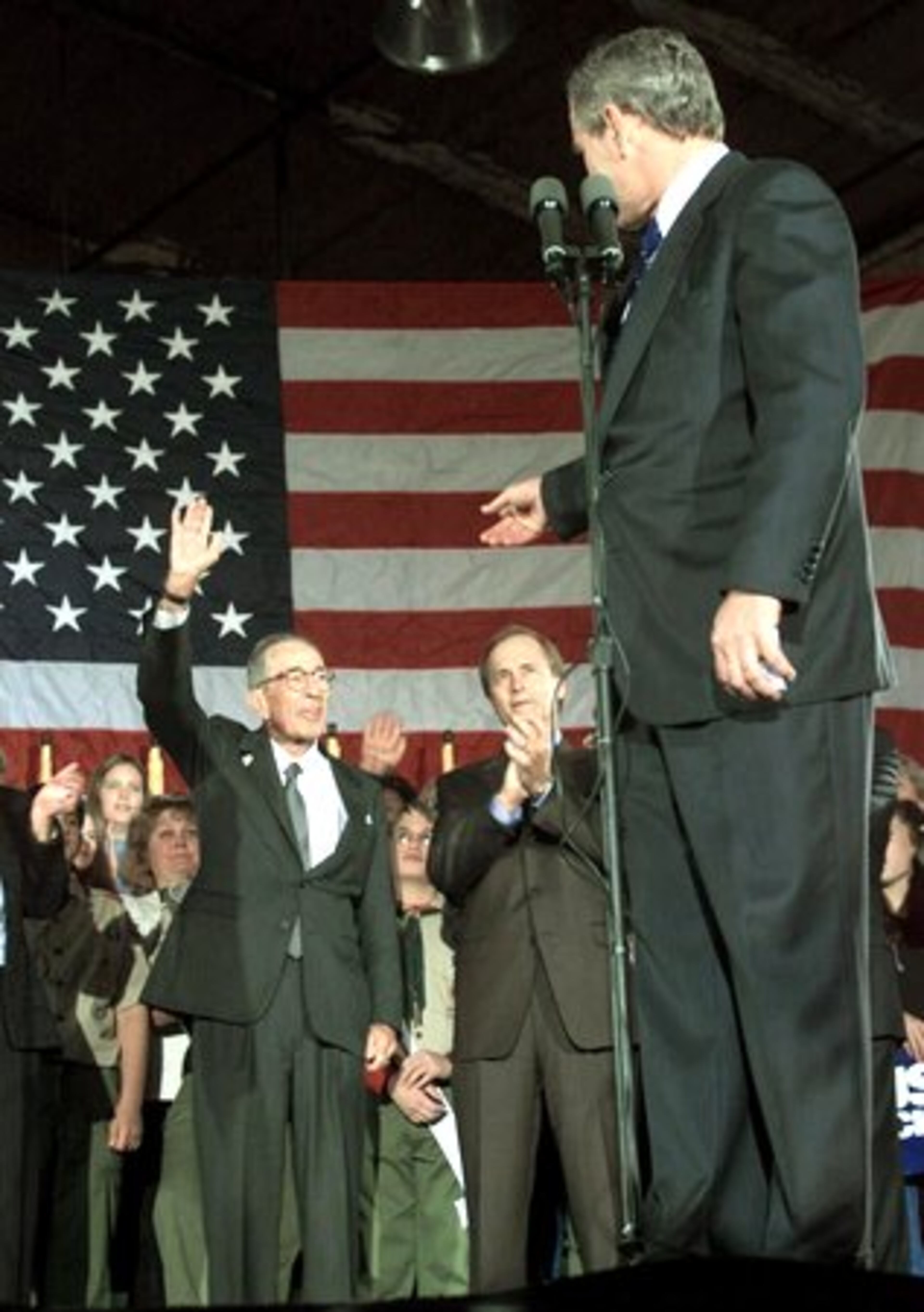 In 1993, Bell was hired by the elder George Bush as his private attorney in the Iran-contra investigation. Bell also counseled the younger Bush's campaign when the 2000 election hinged on the Florida recount. Here, Bell waives when introduced at a 2000 Bush rally.