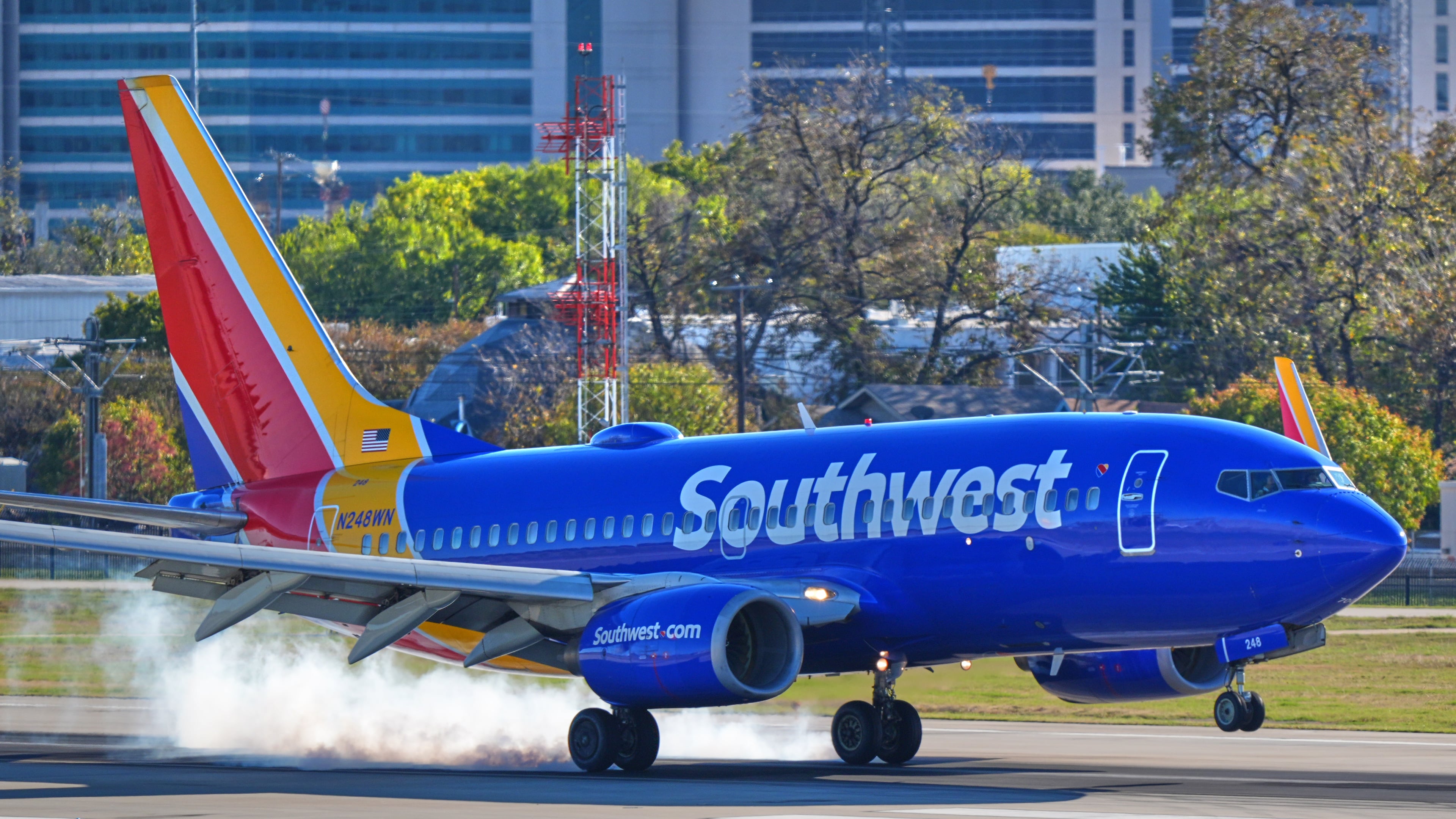 FILE - A Southwest Airlines plane lands at Love Field Airport, Nov. 26, 2025, in Dallas. (AP Photo/LM Otero, File)
