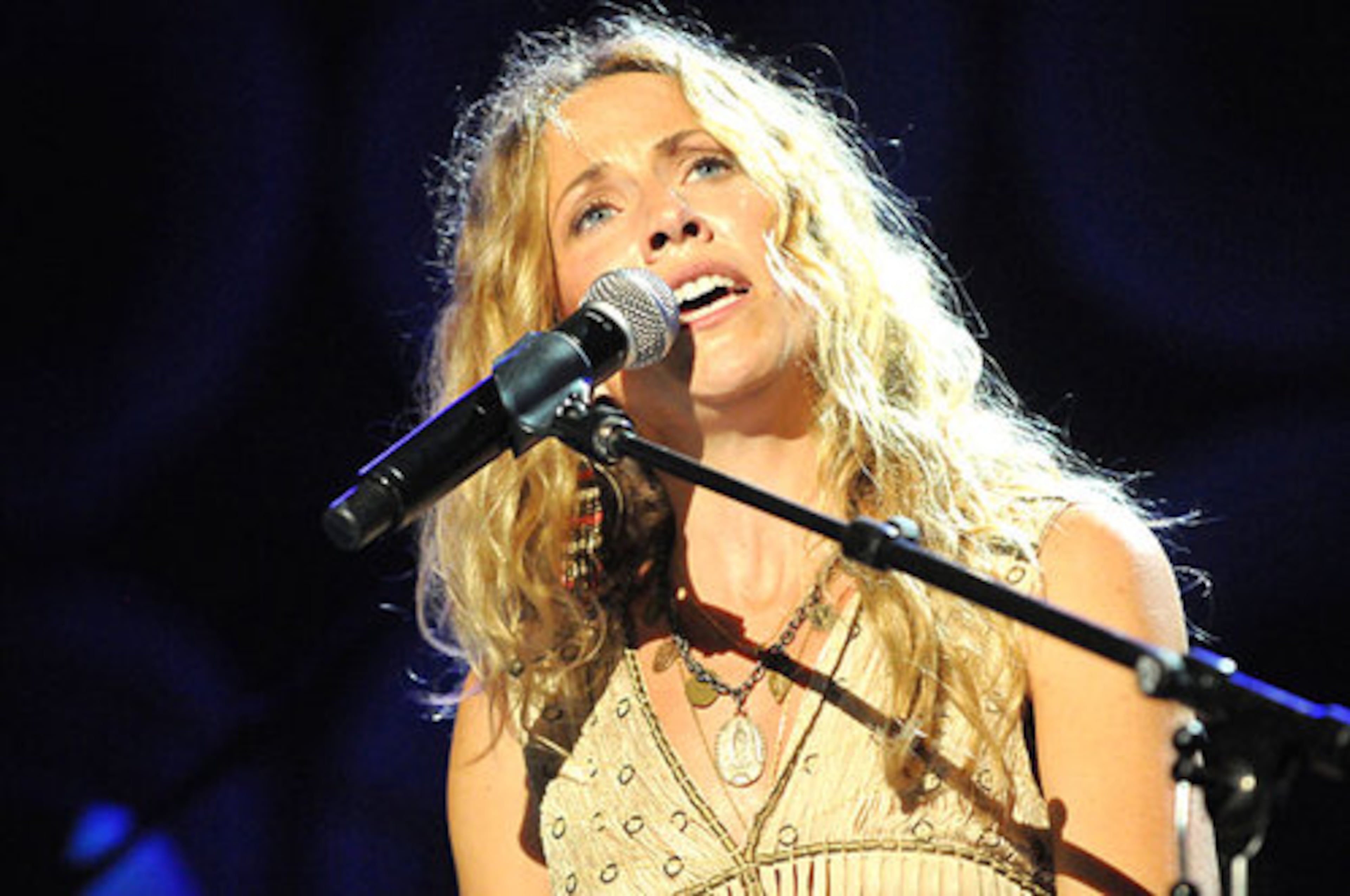 Nine-time Grammy winner Sheryl Crow brought her "100 Miles from Memphis Tour" to the Verizon Amphitheatre at Encore Park in alpharetta Thursday night. Fellow singer-songwriter Colbie Caillat opened the show. Here, Sheryl Crow performs "Our Love Is Fading".