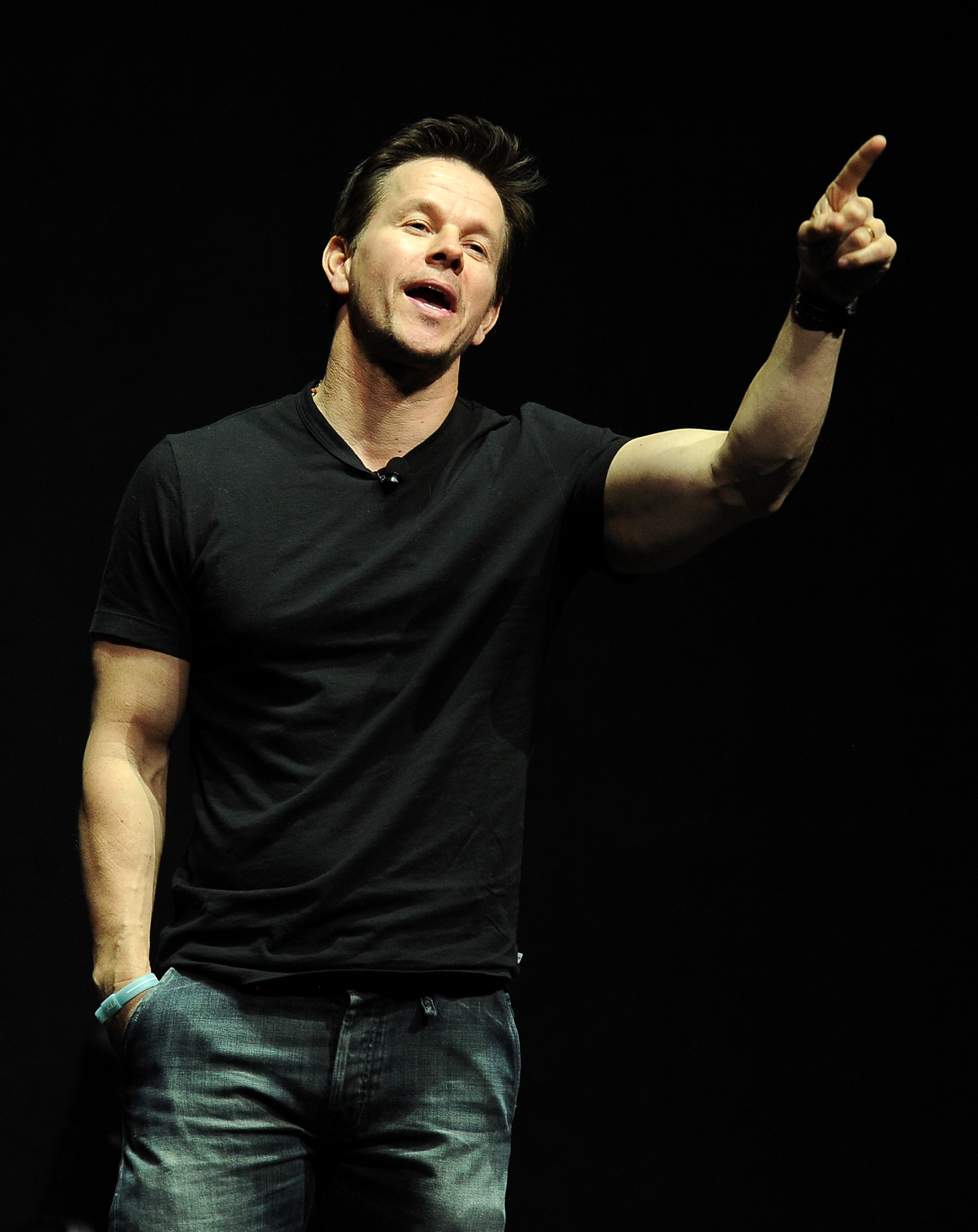 Mark Wahlberg, a cast member in the upcoming film "Transformers: Age of Extinction," addresses the audience at the Opening Night Presentation from Paramount Pictures at CinemaCon 2014 on Monday, March 24, 2014, in Las Vegas. (Photo by Chris Pizzello/Invision/AP)