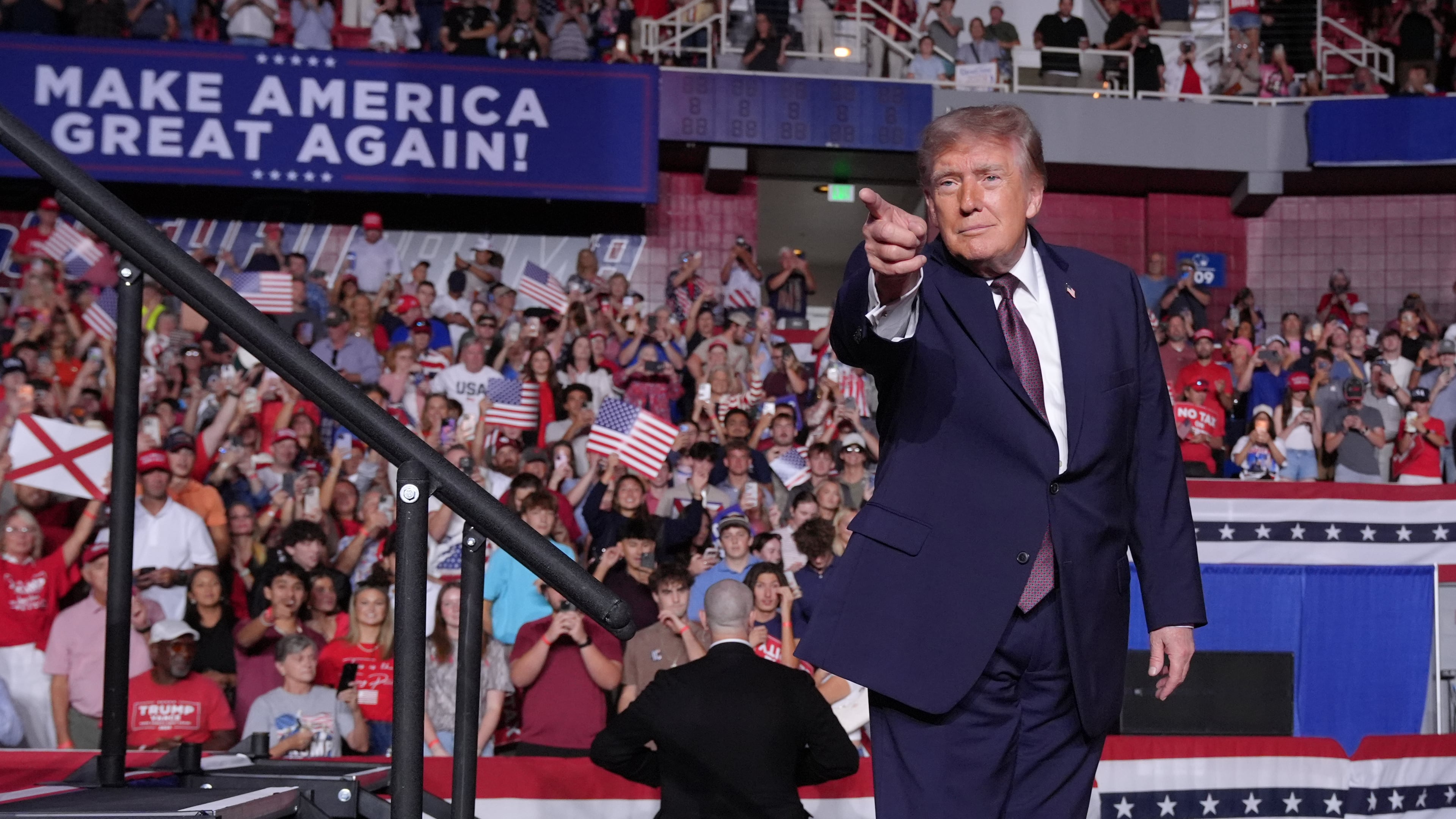 President Donald Trump gestures at a campaign rally at The Mitchell Center in Mobile, Ala., Friday, Oct. 2, 2026. (AP Photo/Jacquelyn Martin)