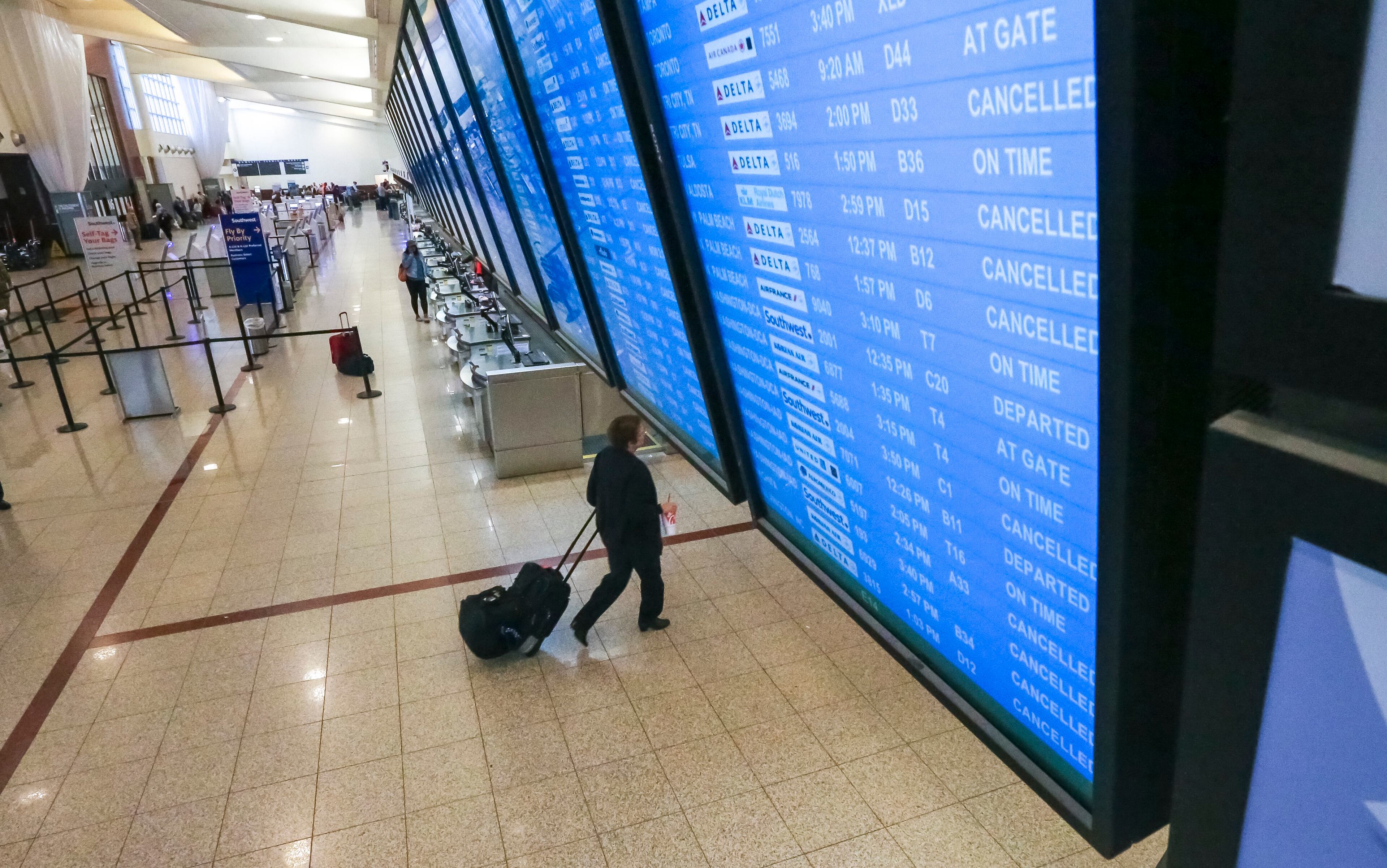 September 11, 2017 Atlanta: Delta Air Lines canceled 900 flights as tropical storm Irma made its way towards Atlanta. Southwest Airlines, the second-largest carrier at Hartsfield-Jackson, canceled all of its Atlanta flights after 1 p.m., amounting to 60 to 70 percent of its Atlanta flights scheduled for Monday. Atlanta-based Delta said the expected north-south winds of 40 mph or greater will run perpendicular to the five parallel runways at Hartsfield-Jackson International Airport, which can potentially threaten the safety of landings. Planes are best suited to takeoff and land into the wind, according to the airline. The strong crosswinds are expected to exceed the operating limits of some of Deltas mainline and regional jets. The 900 Delta cancellations Monday include hundreds of flights at the airlines massive hub in Atlanta, as well as continuing cancellations in Florida and the Caribbean. Delta has also canceld some of its flights into Brunswick, Ga. Even more flights could be canceled due to wind shear, lightning and other weather. Tropical storm, Irma began to make its presence know in Atlanta on Monday, Sept. 11, 2017. The storm claimed at least one life in Georgia, state emergency management officials said Monday. The death occurred in Worth County. Further details werent immediately available. Irmas staggering march up into northern Florida was expected to bring high winds and heavy rains to Atlanta Monday afternoon though perhaps not quite as high or as heavy as earlier feared. Georgia Powers outage map showed 400,000 of its customers were down, and the electric membership cooperatives, as of 12:45 p.m., added another 268,000 to the total. Most of the failures were along the Georgia coast and in South Georgia. But the outages began to creep northward: 22,000 metro Atlanta customers had no power as of 12:20 p.m., the Georgia Power map showed. JOHN SPINK/JSPINK@AJC.COM
