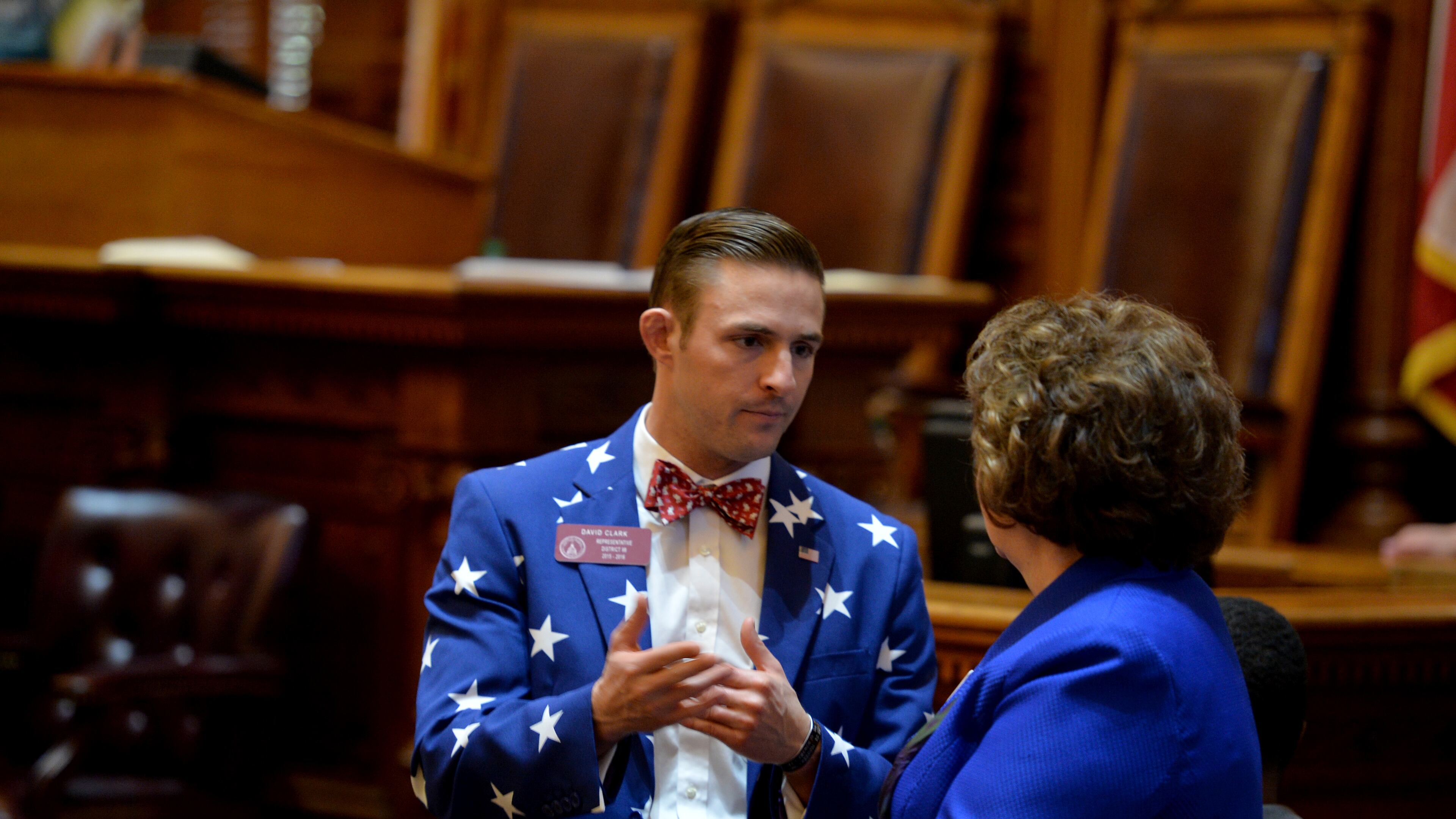Atlanta. Rep. David Clark and Rep. Jan Tanersley chat on the House floor before the start of the final day of the session. BRANT SANDERLIN/BSANDERLIN@AJC.COM