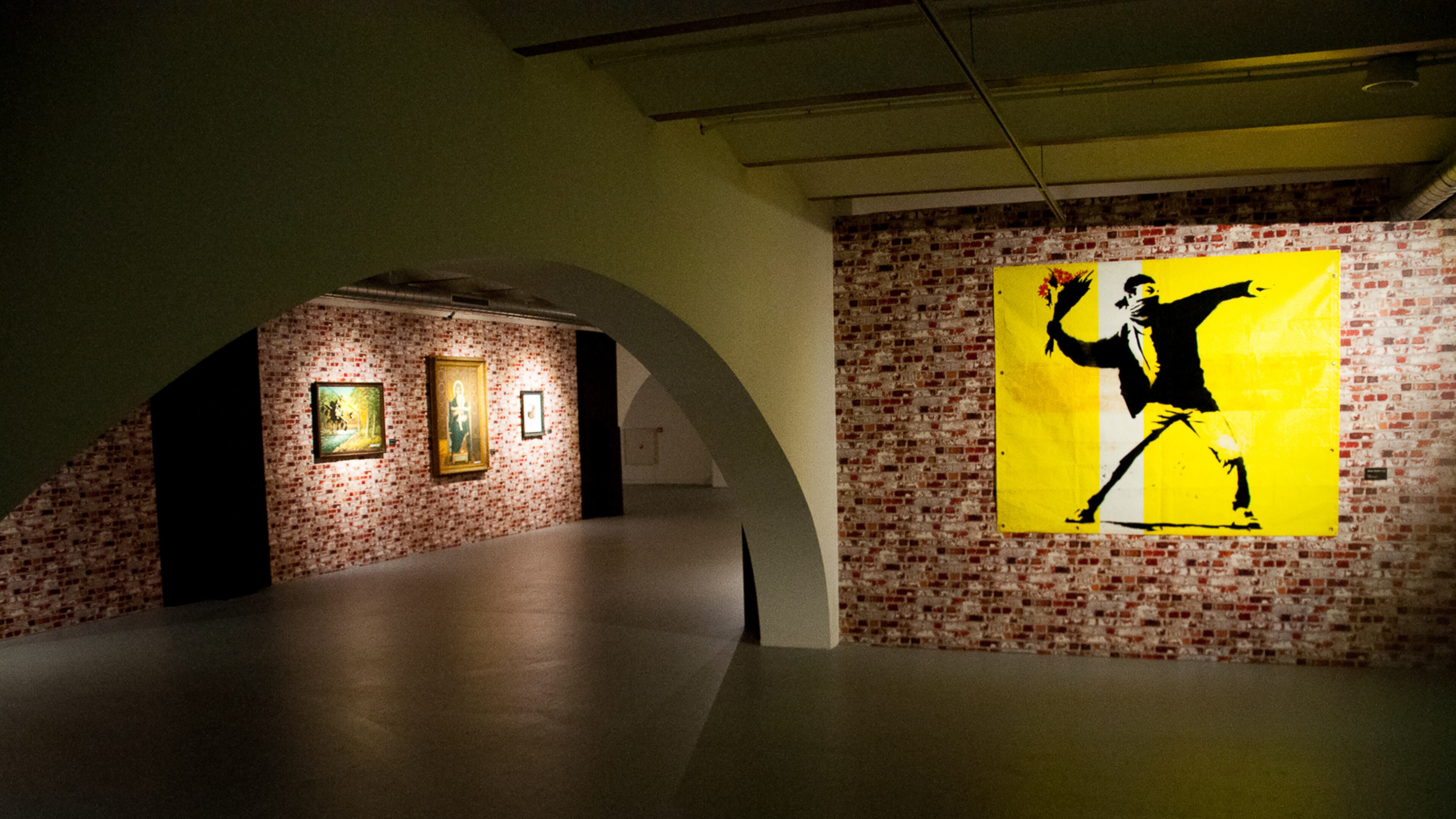 An exhibit of images created by the elusive street artist Banksy, on display in Amsterdam in this photo, will be coming to Atlanta this fall. Courtesy of SEE Global Entertainment