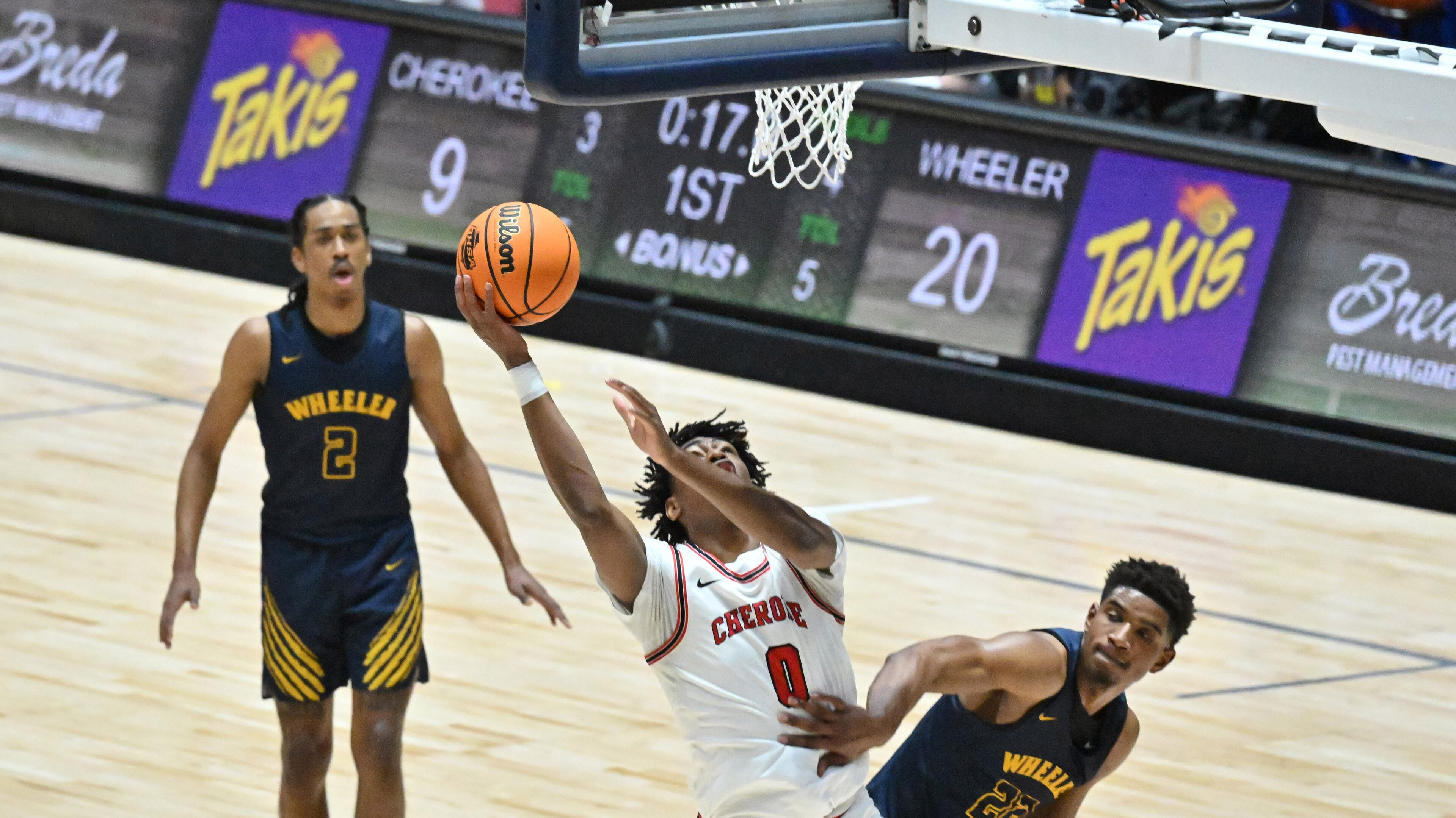 Cherokee's Dastin Hart (0) shoots against Wheeler's Arrinten Page (22) during 2023 GHSA Basketball Class 7A Boy’s State Championship game at the Macon Centreplex, Saturday, March 11, 2023, in Macon, GA. (Hyosub Shin / Hyosub.Shin@ajc.com)