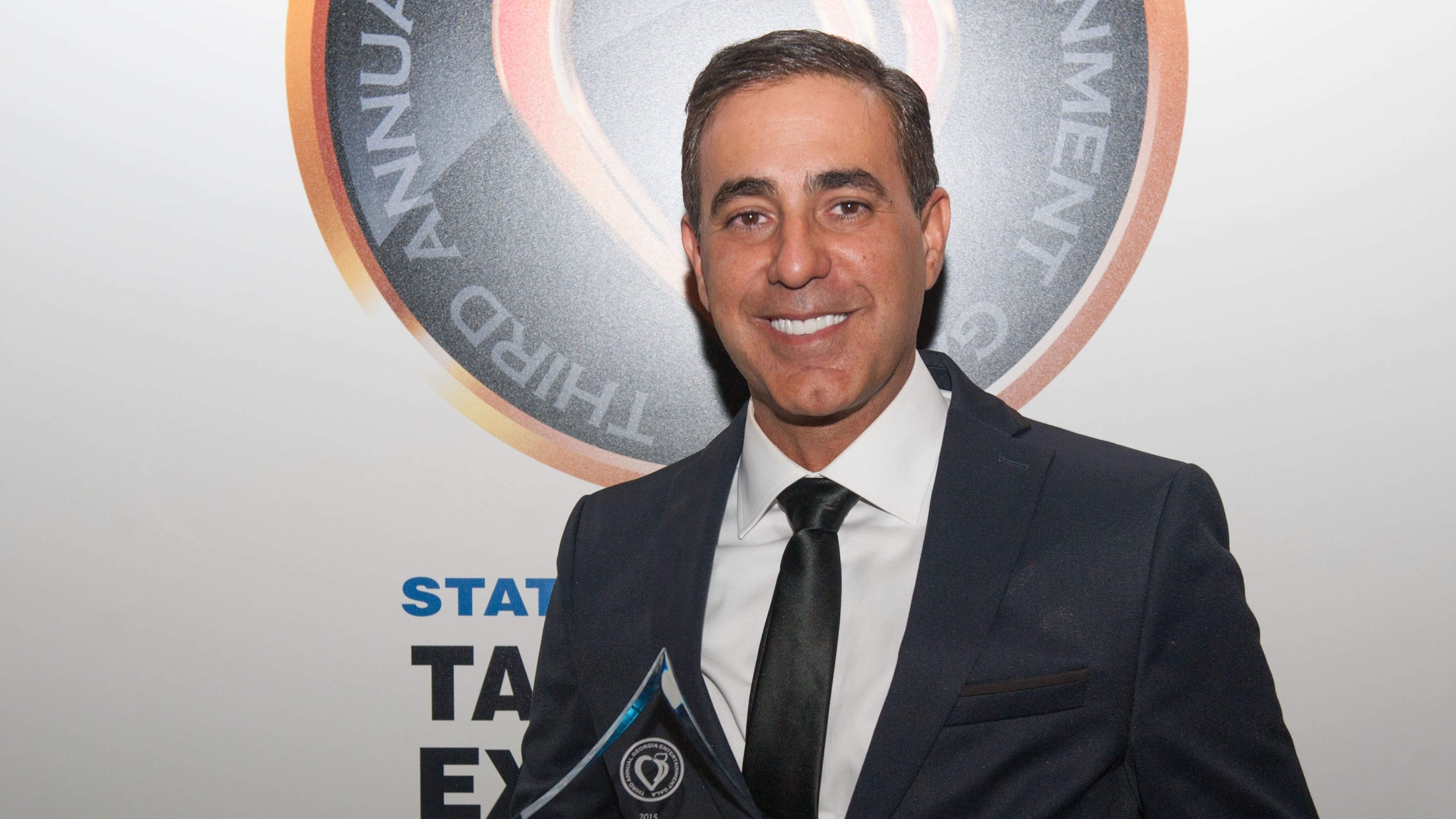 ATLANTA, GA - JANUARY 10: Ozzie Areu receives the "Georgia Highlight" award during the 3rd Annual Georgia Entertainment Gala at Georgia World Congress Center on January 10, 2015 in Atlanta, Georgia. (Photo by Marcus Ingram/Getty Images)