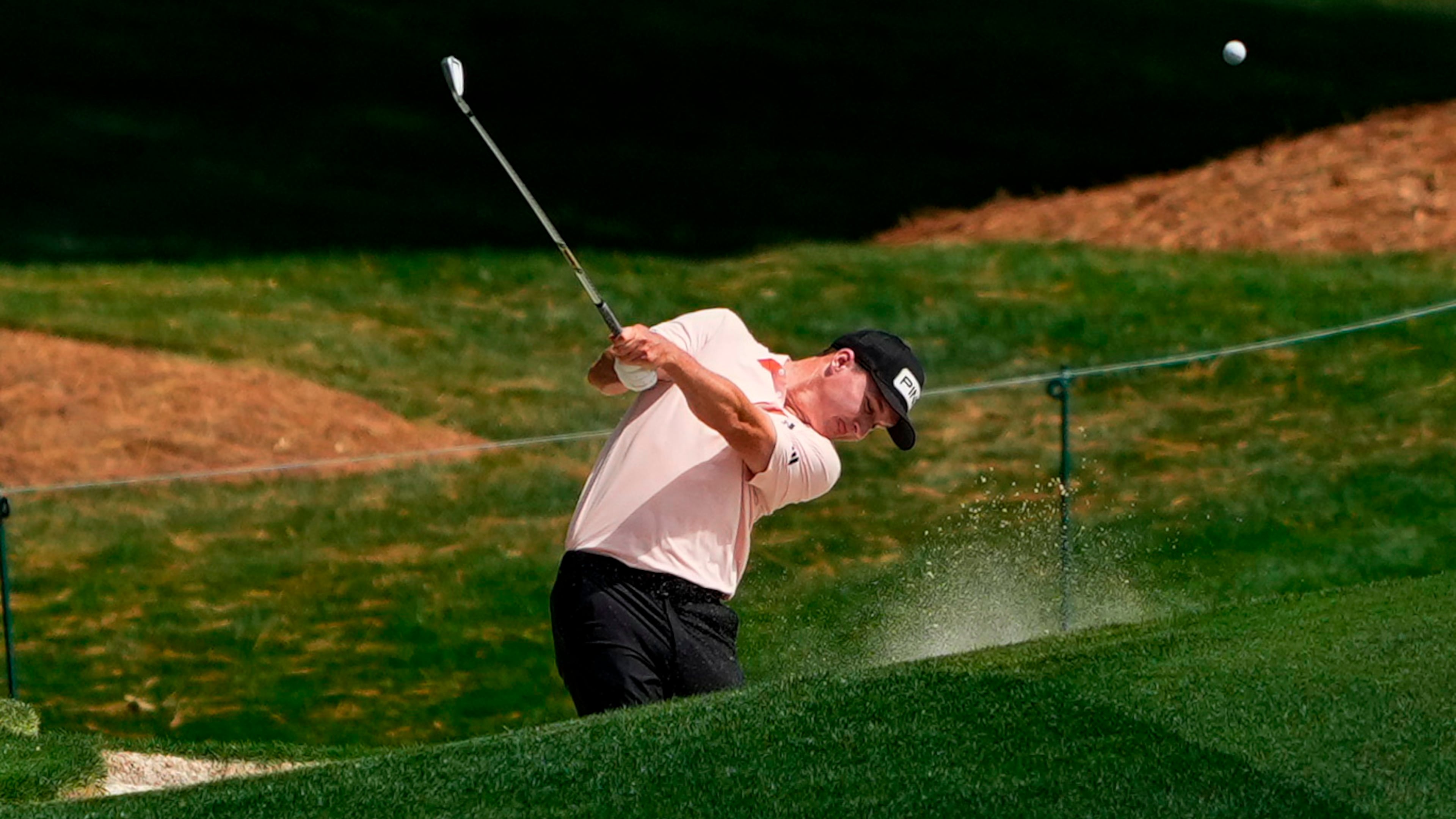 Matt McCarty hits from the 18th fairway during first round of the Truist Championship golf tournament at the Quail Hollow Club, Thursday, May 7, 2026, in Charlotte, N.C. (AP Photo/Chris Carlson)