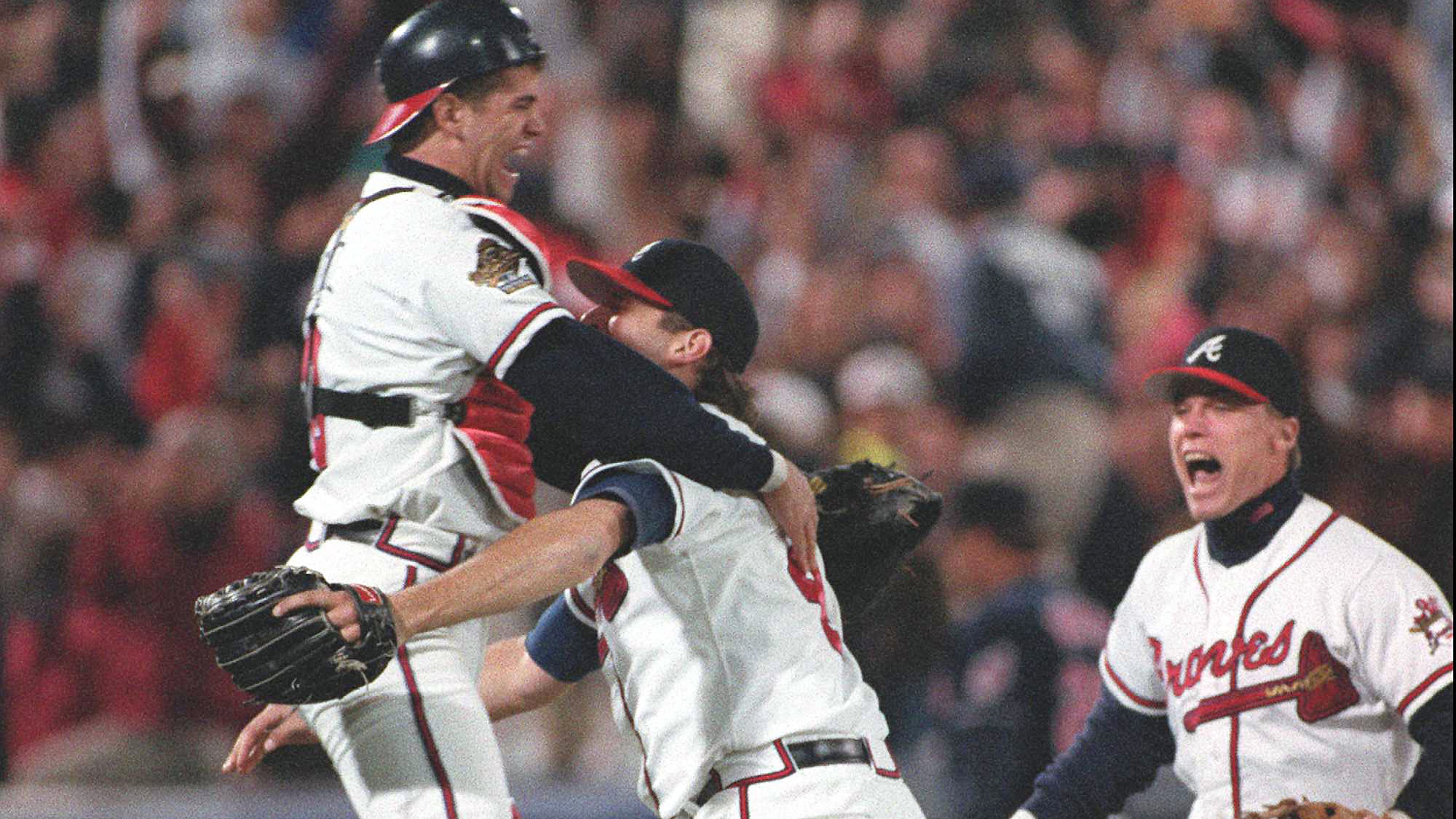 Javy Lopez (from left), Mark Wohlers and Chipper Jones knew how to celebrate.