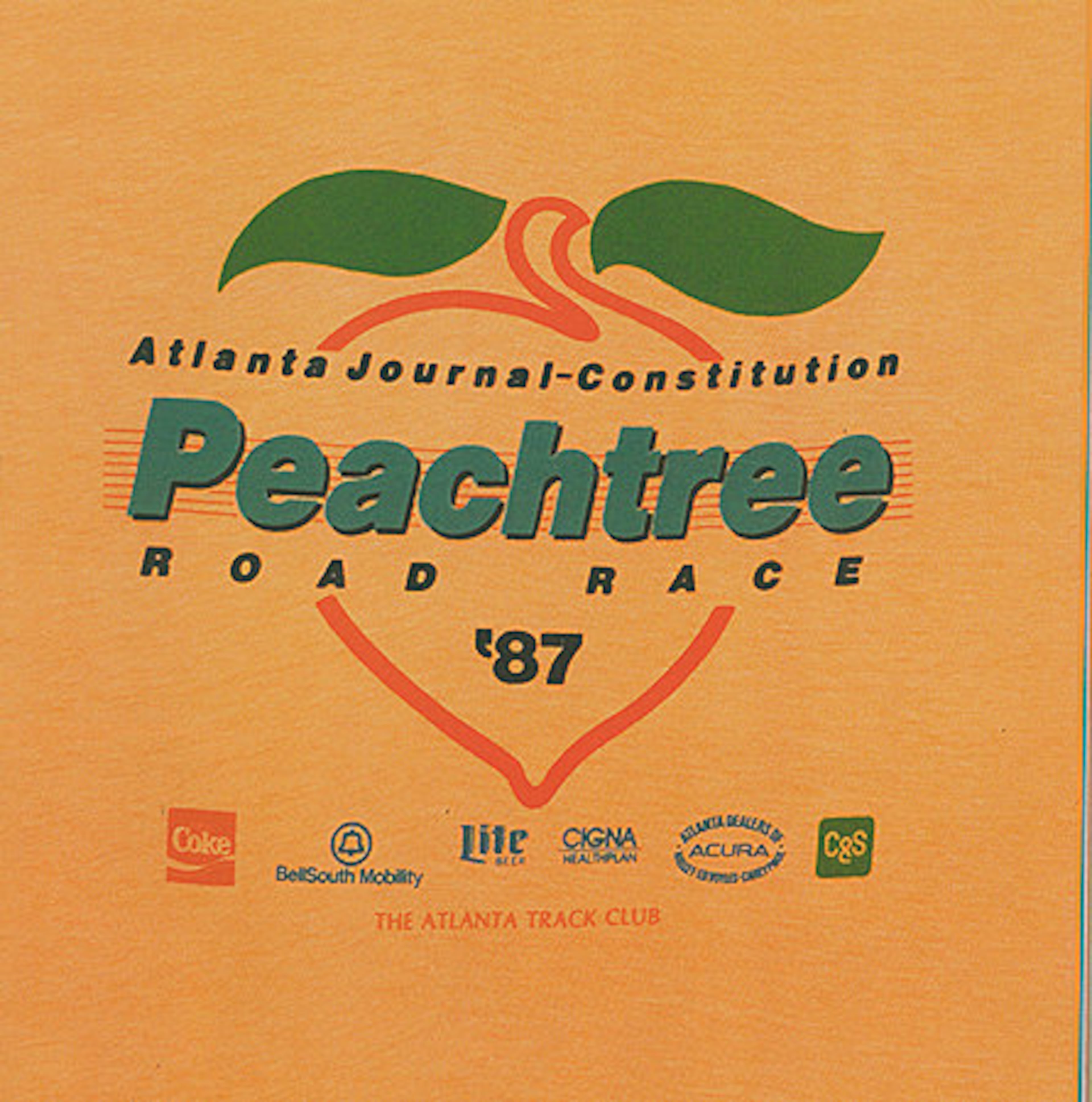 A soft peach shirt complemented the cool, rainy weather for the 1987 race, which was run in 68-degree temperatures.
