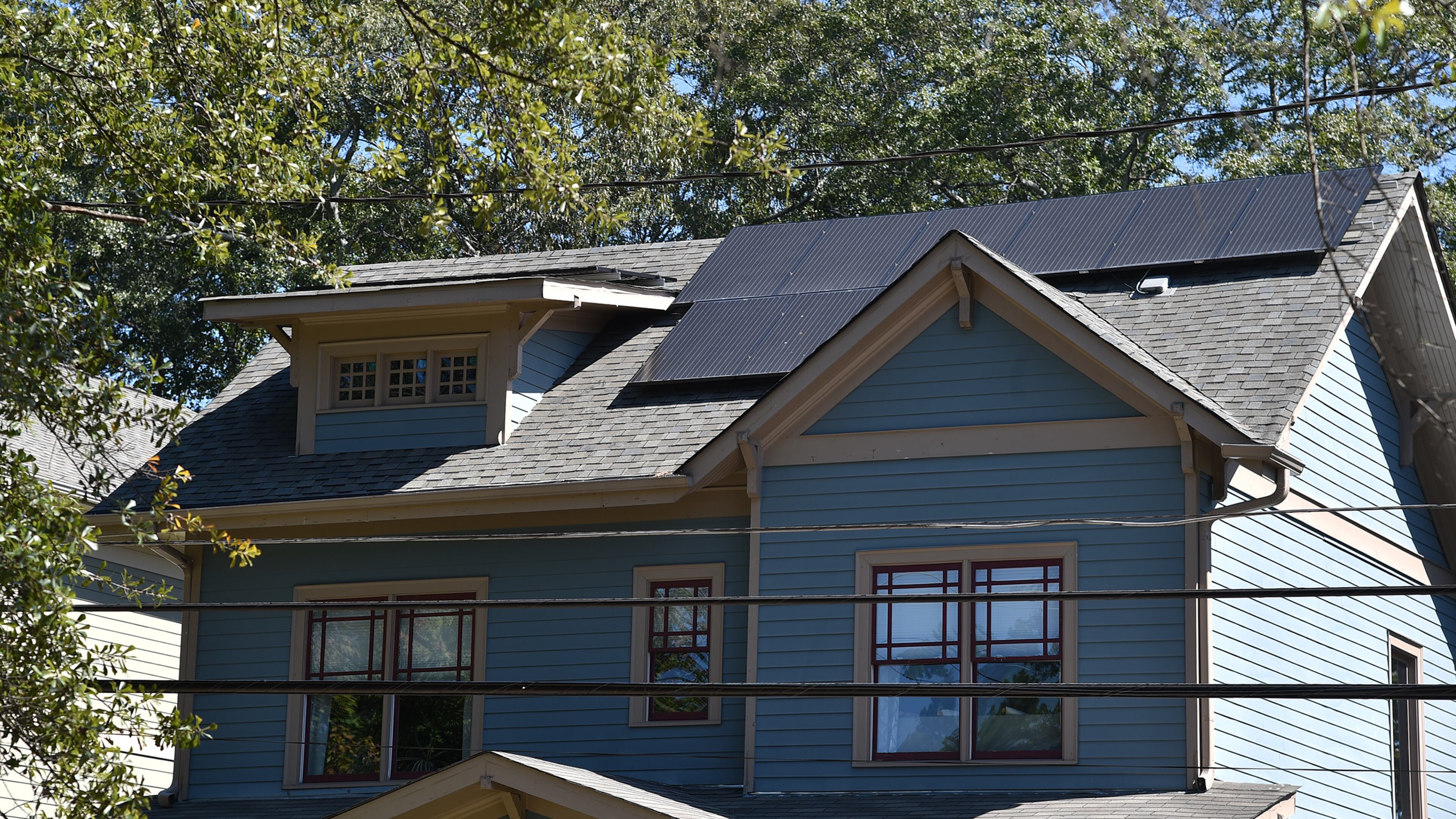 This Brookhaven home is one of the few in the state where the owner used a 2015 state law to finance a solar power unit. Lawmakers are looking at tweaking the law to make it more effective. BRANT SANDERLIN/BSANDERLIN@AJC.COM
