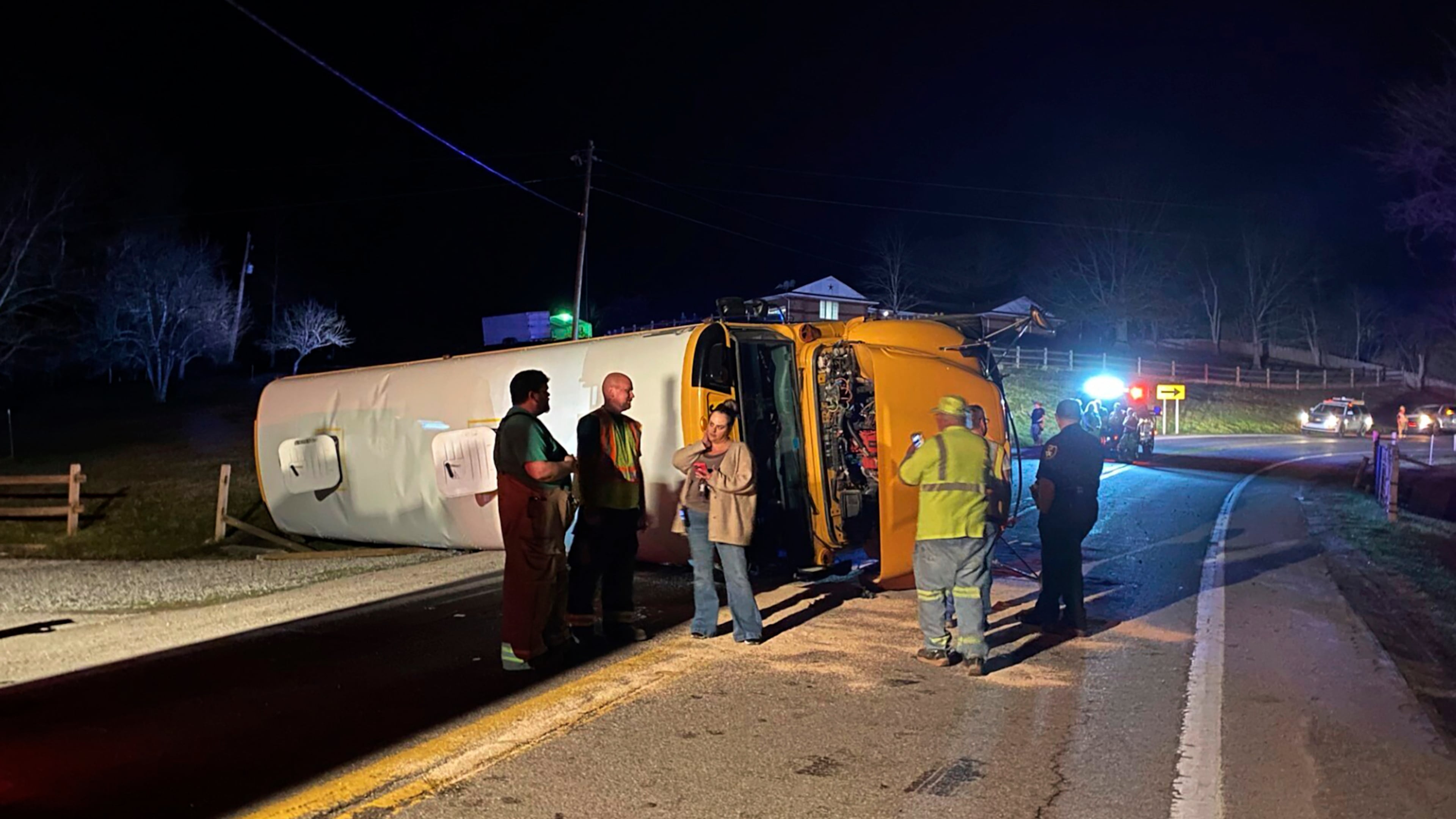 FILE - Emergency personnel respond to the scene of a bus crash, March 4, 2024, on West Virginia Route 16 in Calhoun County, W.Va. (WCHS TV via AP, File)