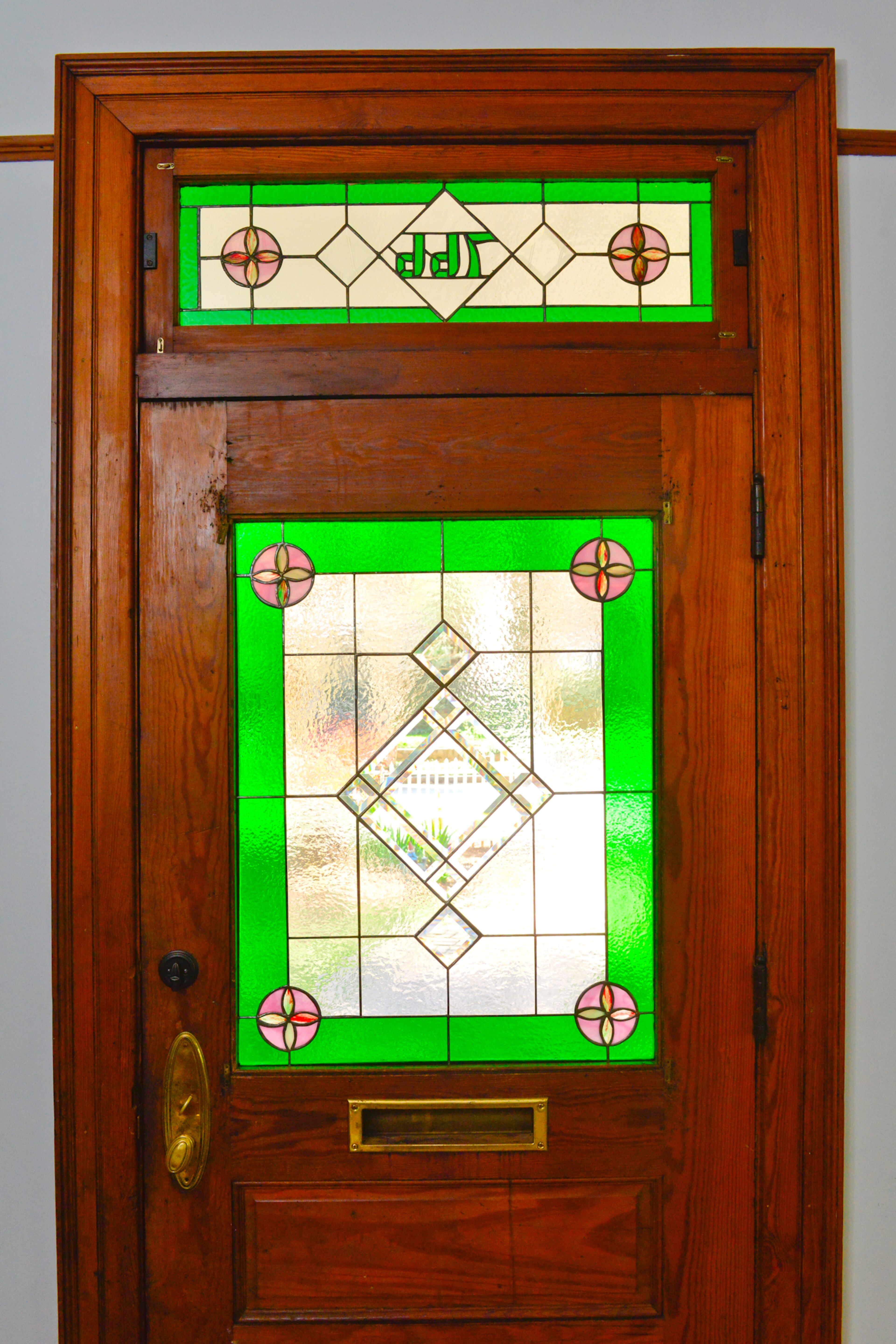 The stained glass and the transom were made for the previous owners, who restored the century-old home in Inman Park.