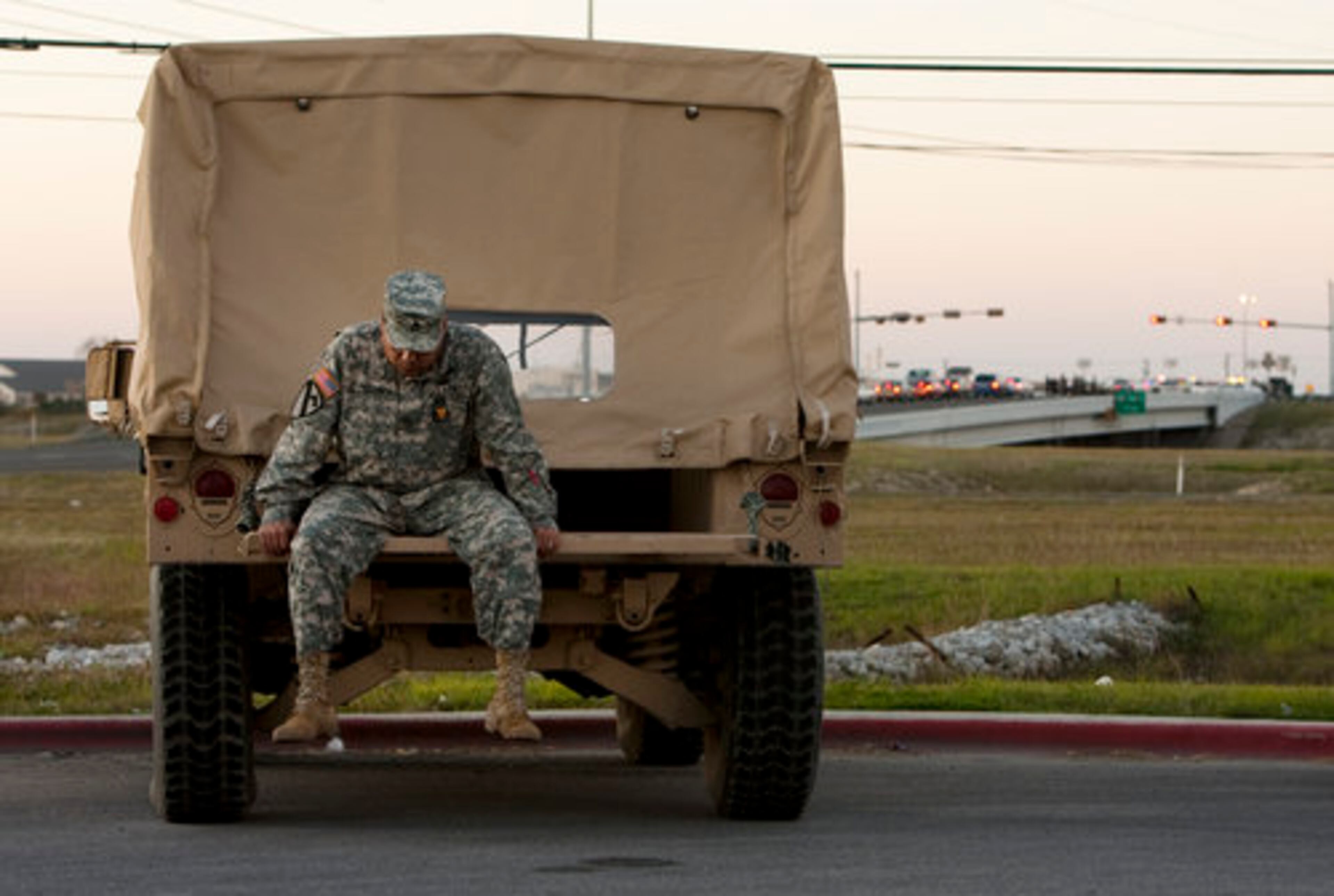 Sgt. 1st Class Noe Figueroa waits to get back on base outside Fort Hood's Clear Creek gate. "I think it's sad for all the soldiers that got hurt, that got killed. It shouldn't have happened," he said.