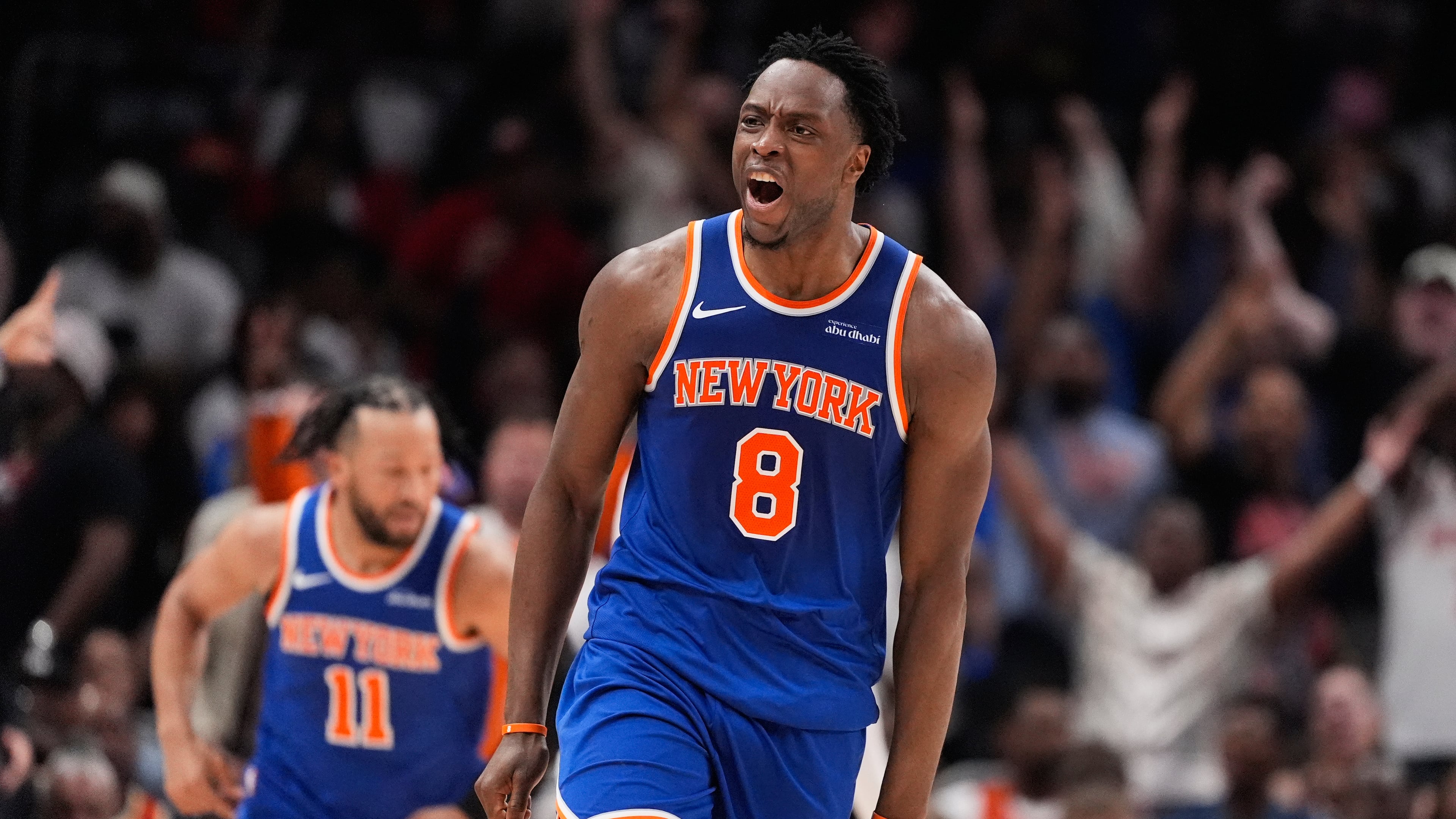 New York Knicks forward Og Anunoby (8) reacts after scoring during the first half of Game 4 in a first-round NBA playoffs basketball series against the Atlanta Hawks Saturday, April 25, 2026, in Atlanta. (AP Photo/Brynn Anderson)