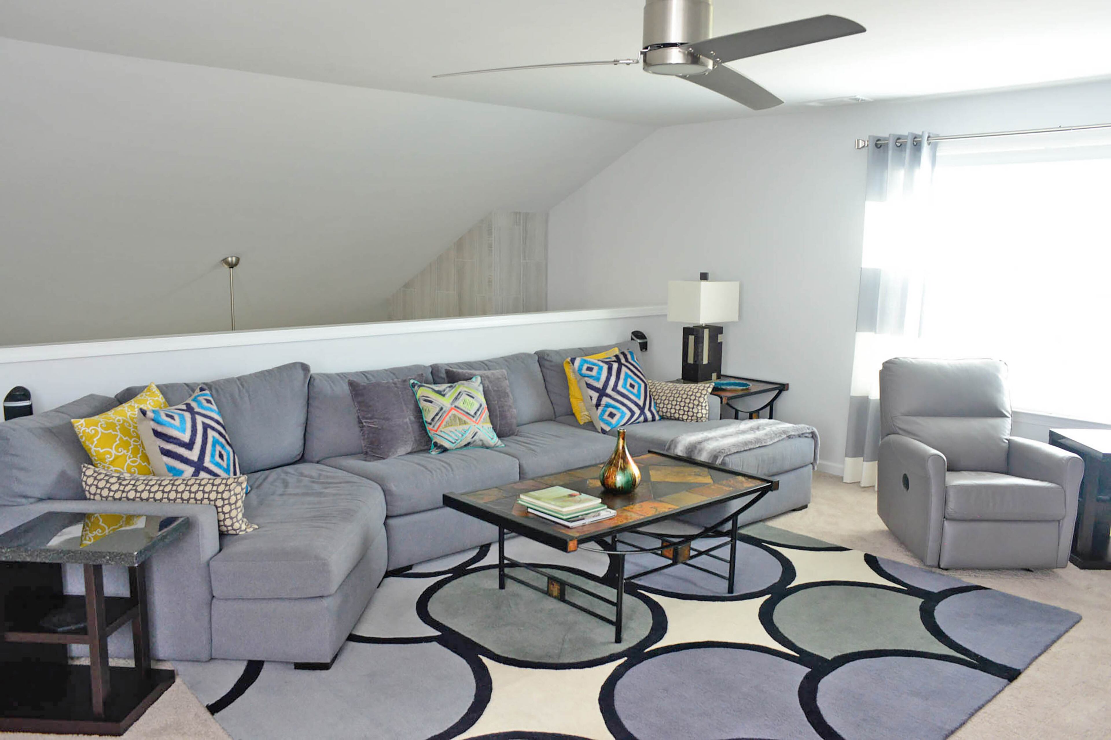 The loft is a place to watch TV and movies, and to listen to music, making it one of Anthony Ware's favorite spots in the home.