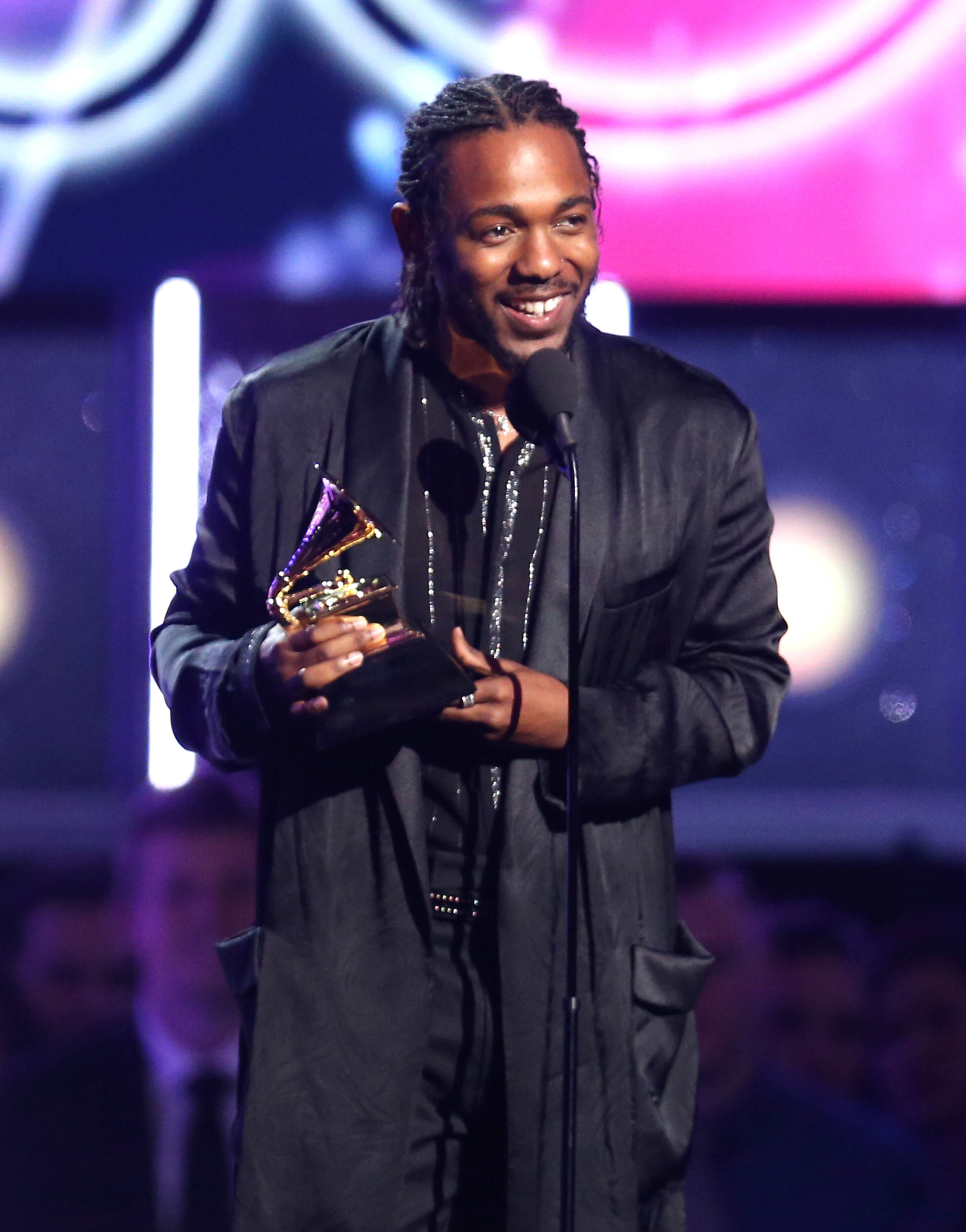 Kendrick Lamar accepts the award for best rap album for "Damn" at the 60th annual Grammy Awards at Madison Square Garden on Sunday, Jan. 28, 2018, in New York. (Photo by Matt Sayles/Invision/AP)