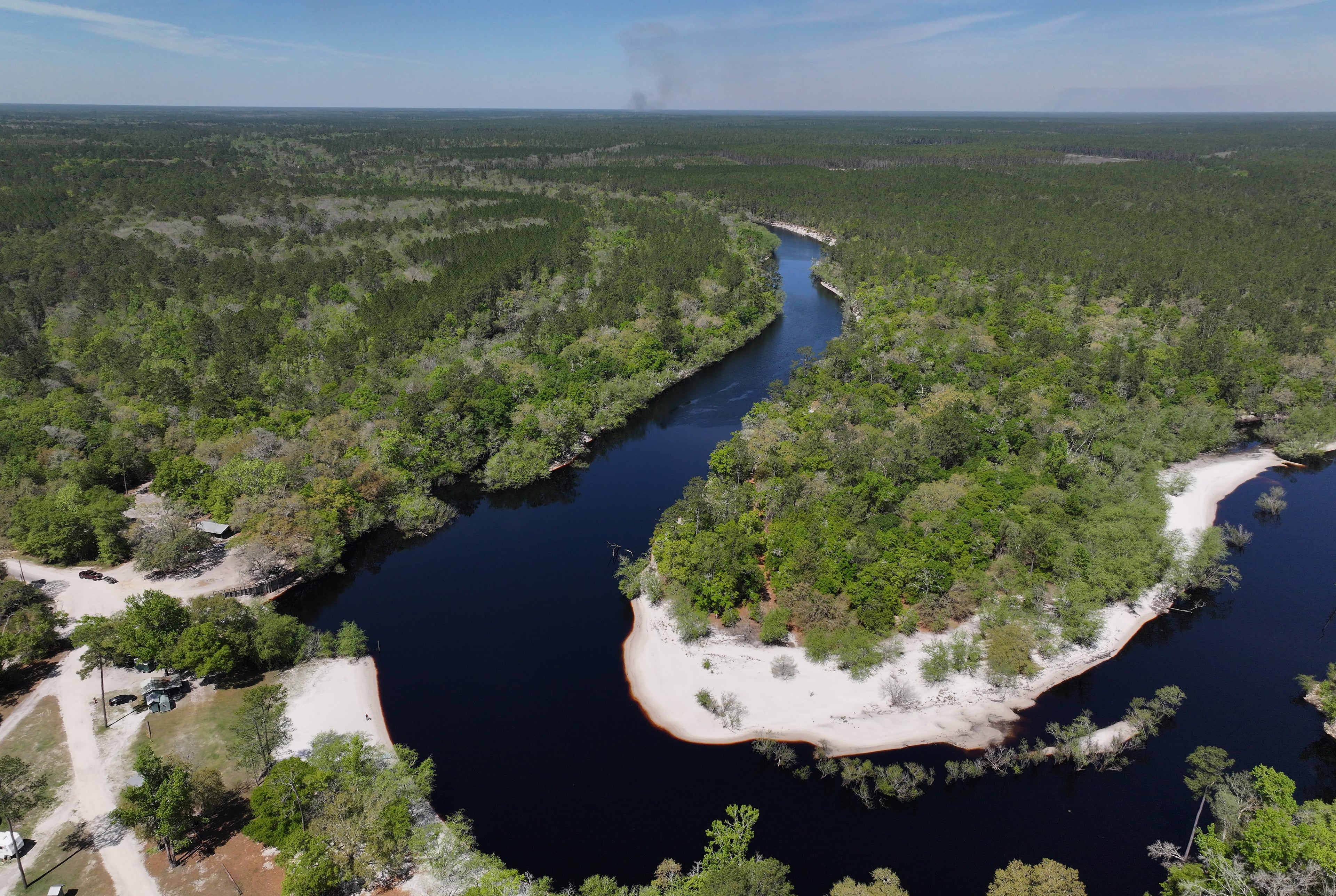 Drone photograph shows the St. Marys River in Macclenny, Florida, Wednesday, Mar. 20, 2024. The St. Marys River serves as the border between Georgia (right side) and Florida (left side). The 130-mile St. Marys River is a blackwater river located in southeast Georgia and is bordered by the Satilla River Basin to the north and the Suwannee River Basin to the west. (Hyosub Shin/AJC))