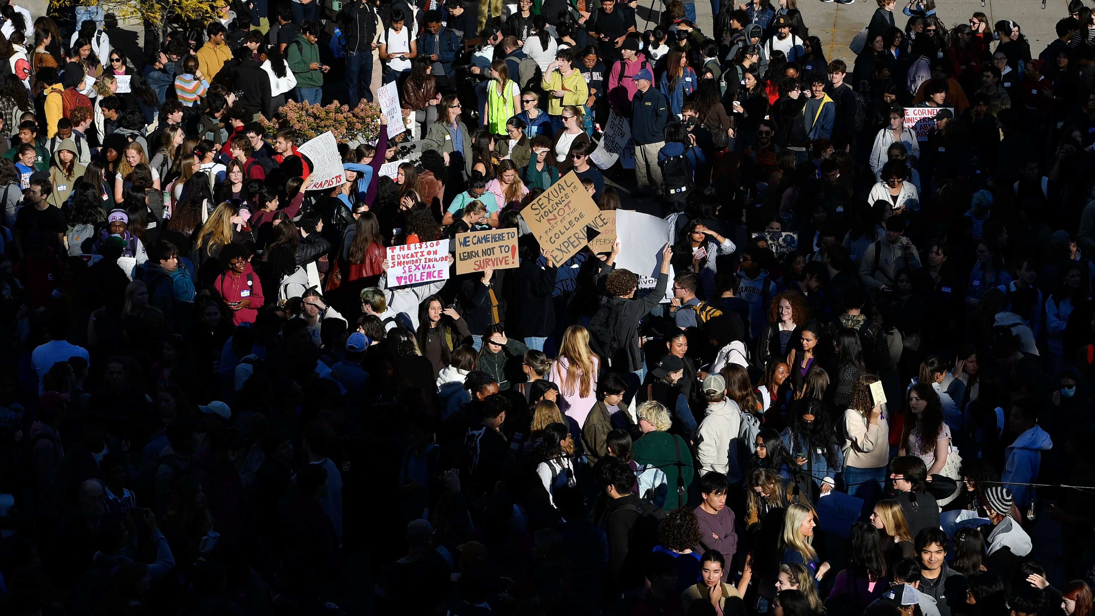 Demonstrators attend a protest against Cornell University's handling of the 2024 fraternity-house gang rape allegations at the campus, Monday, Oct. 5, 2026, in Ithaca, N.Y. (AP Photo/Adrian Kraus)