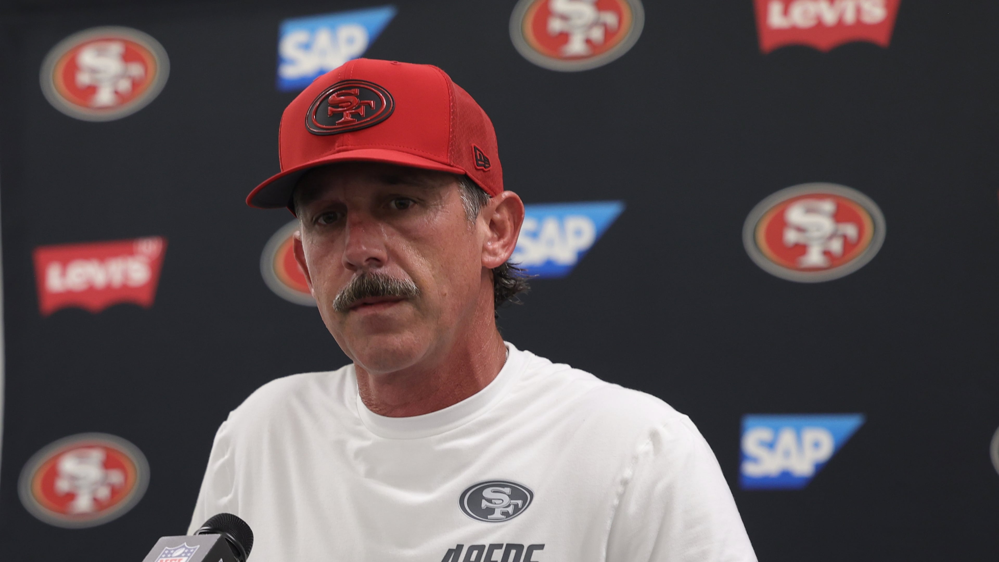San Francisco 49ers head coach Kyle Shanahan speaks at a news conference after a preseason NFL football game against the Los Angeles Chargers, Thursday, Aug. 20, 2026, in Inglewood, Calif. (AP Photo/Ryan Sun)